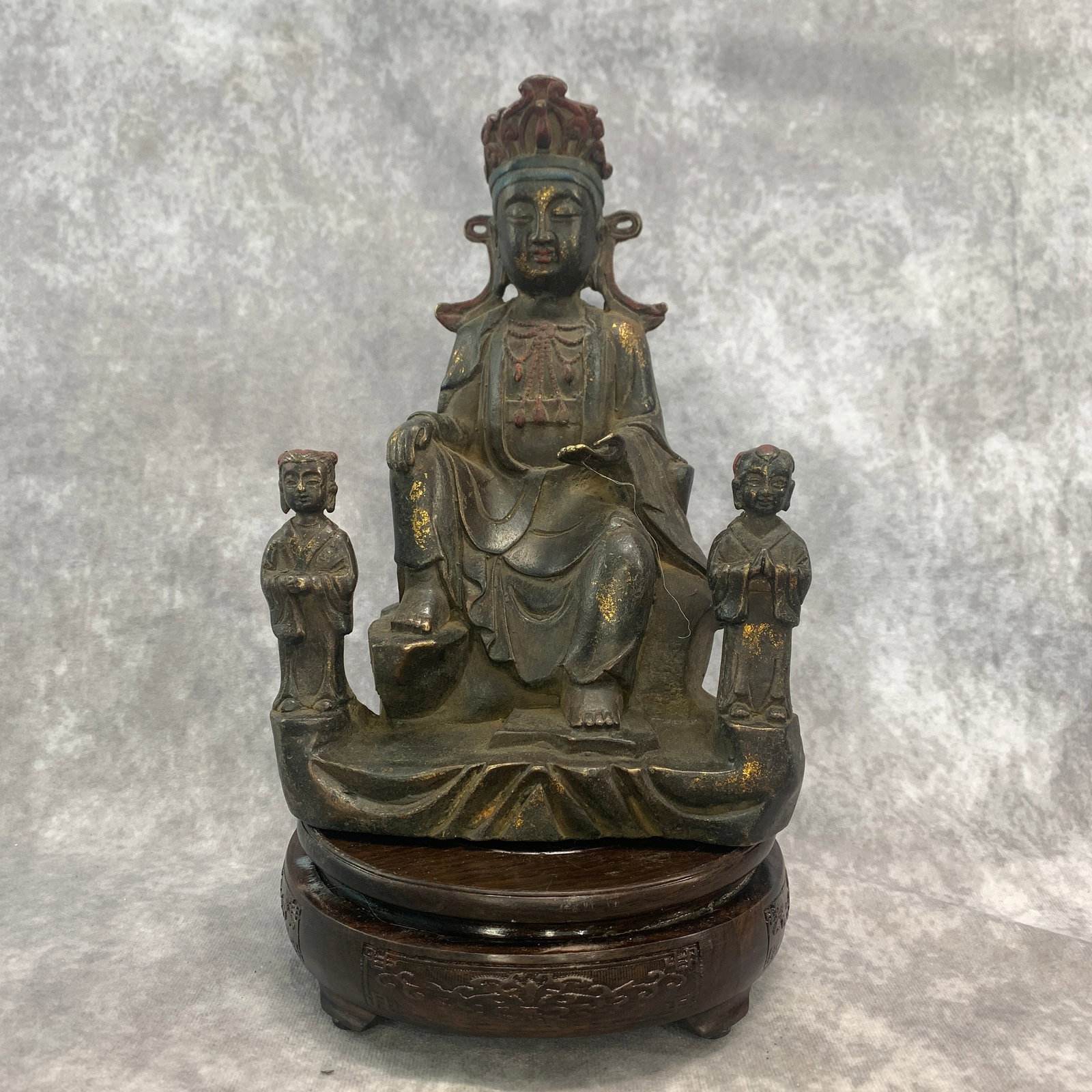 BRONZE STATUE FEATURING THE SEA GODDESS MAZU: Qing Dynasty; Long: 6.5 inch; Width: 3.8 inch; High: 9.2 inch; . Wooden base for display only