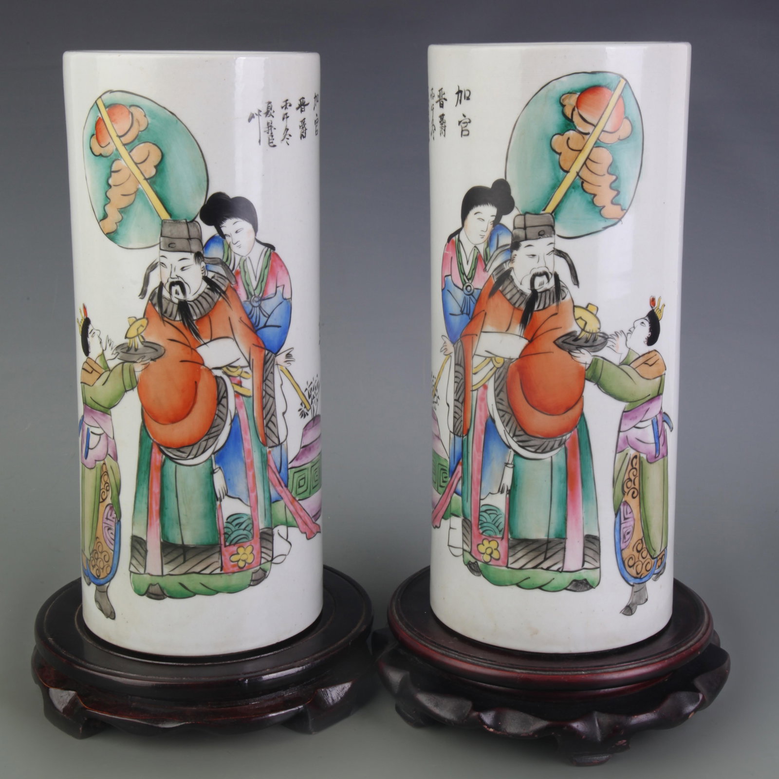 PAIR OF FAMILLE ROSE PORCELAIN HAT STANDS WITH FIGURE PATTERNS: Republic Period; Diameter: 4.6 inch High: 10.6 inch . Wooden base for display only