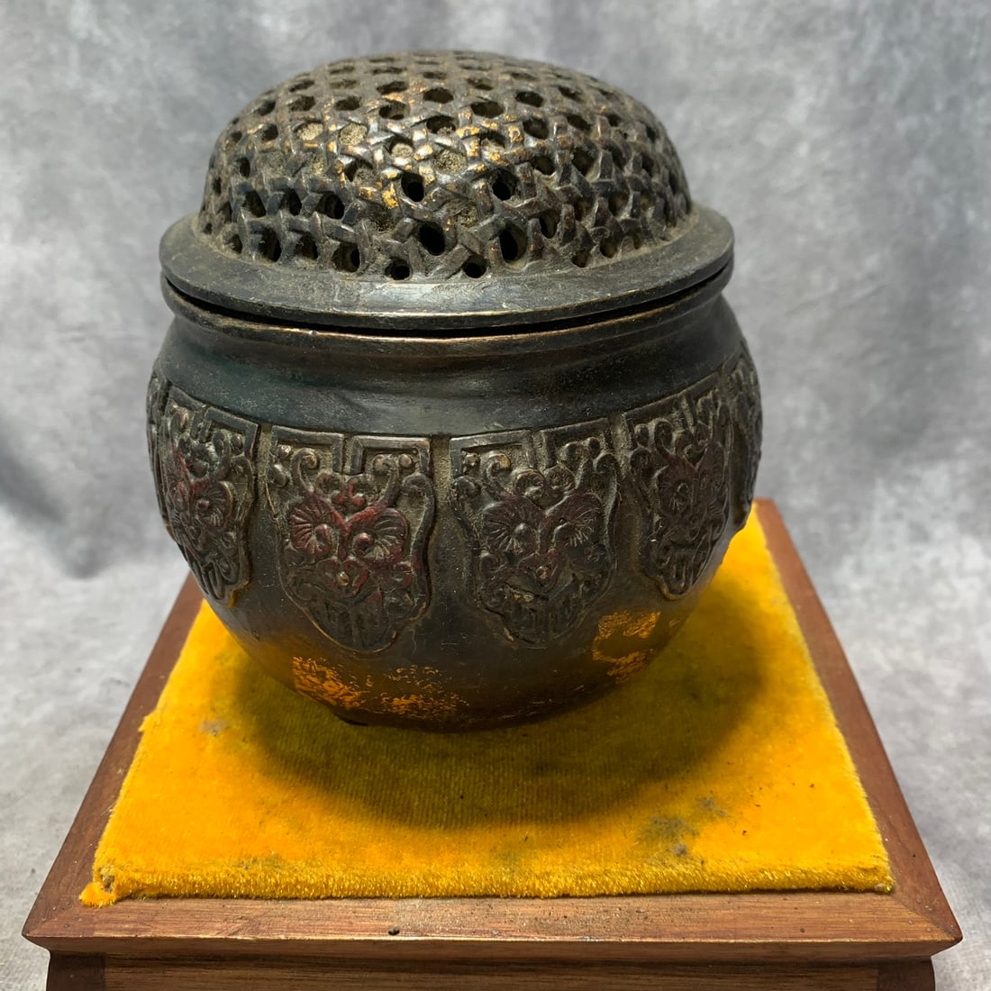A GILT-BRONZE TRIPOD CENSER WITH RUYI MOTIF, XUANDE MARK, MING DYNASTY: Ming Dynasty Style; High: 5.1 inch; Diameter: 4.7 inch. Wooden base for display only