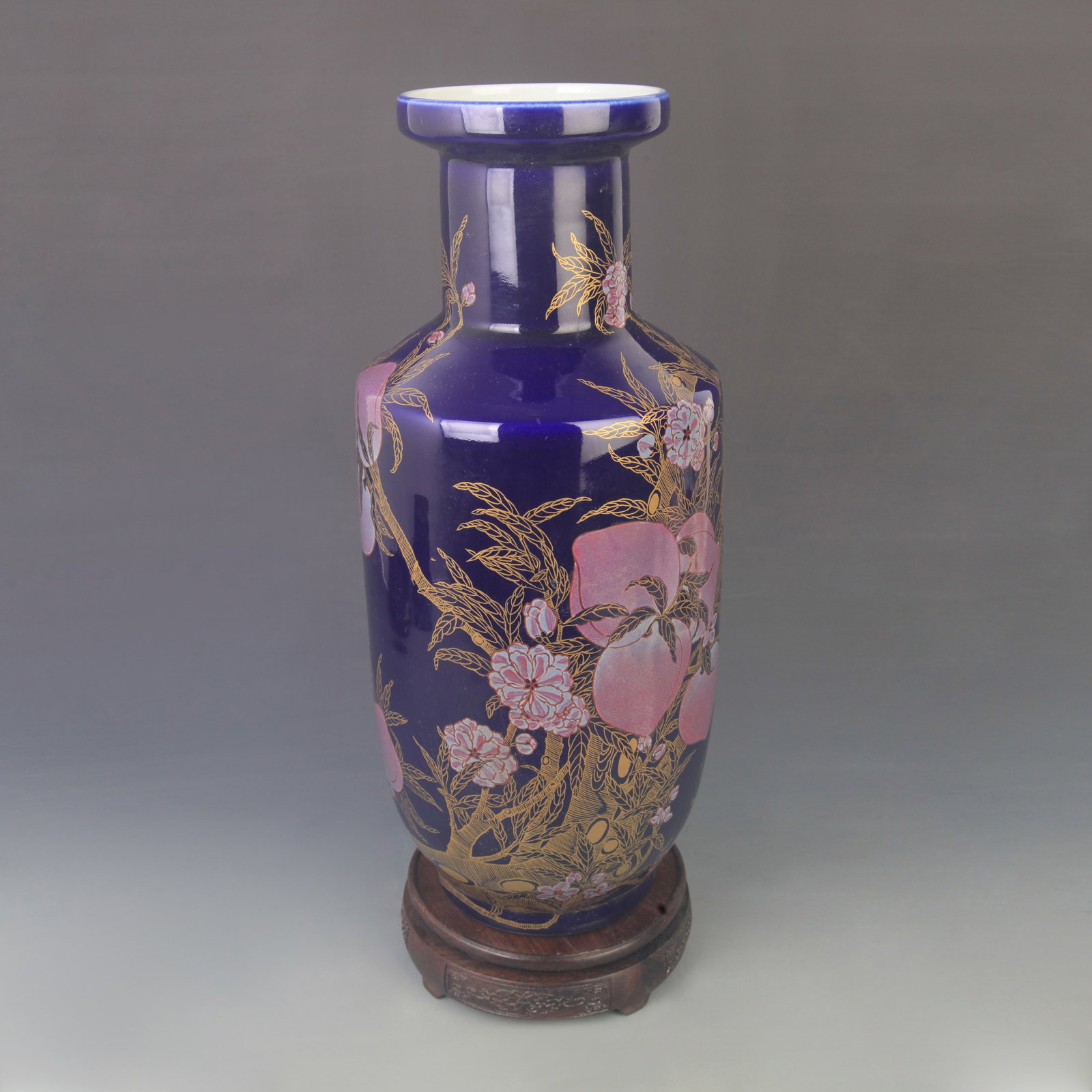 SACRIFICIAL BLUE GLAZED GOLD DECORATED SHOU CHARACTER MALLET VASE: Qing Dynasty Kang Xi Period: High: 16.3 inch; Diameter: 6.80 inch ;Wooden base for picture and display only.