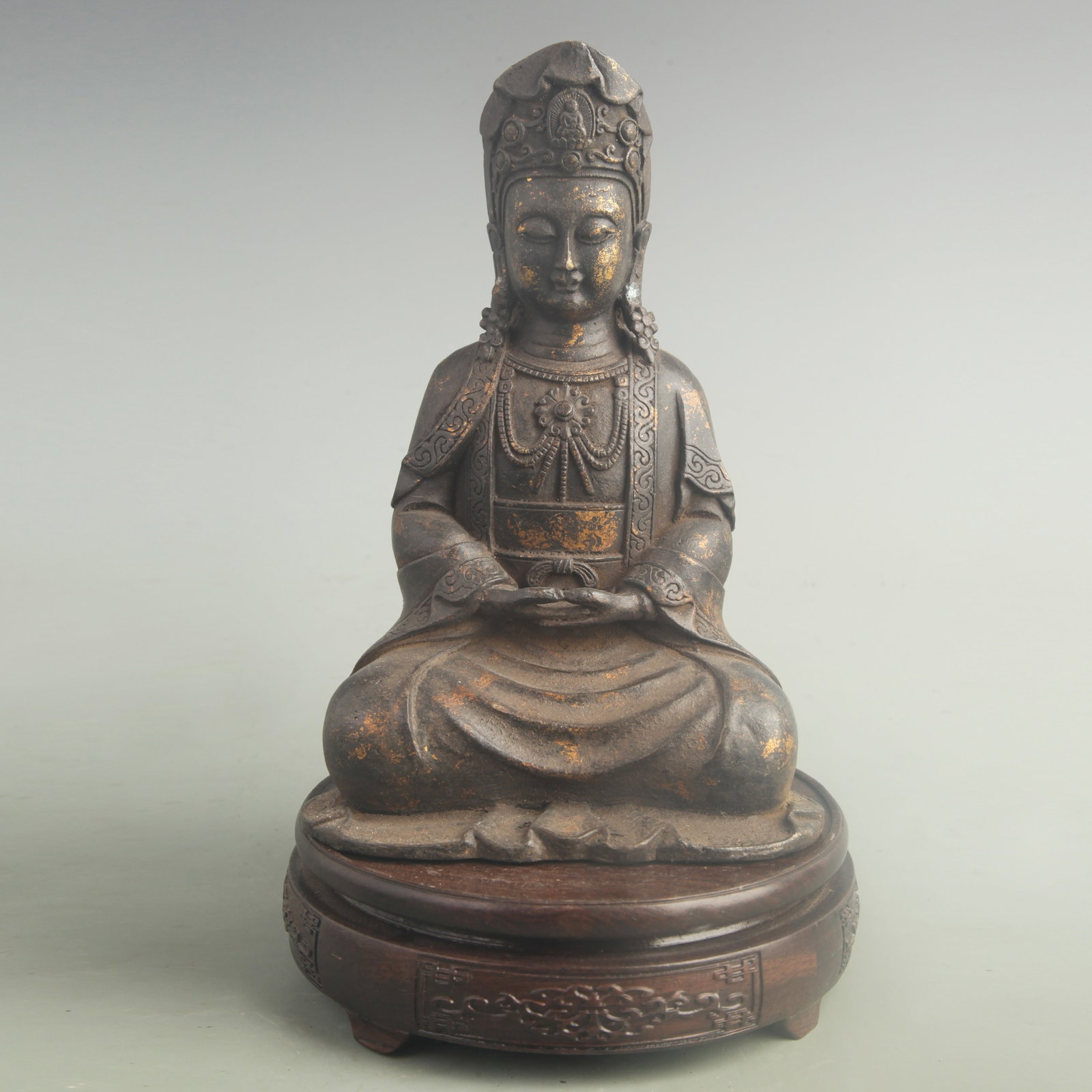 A GILT-BRONZE FIGURE OF GUANYIN: 19th Century; High: 8.50 inch; Width: 5.50 inch ;Wooden base for picture and display only.