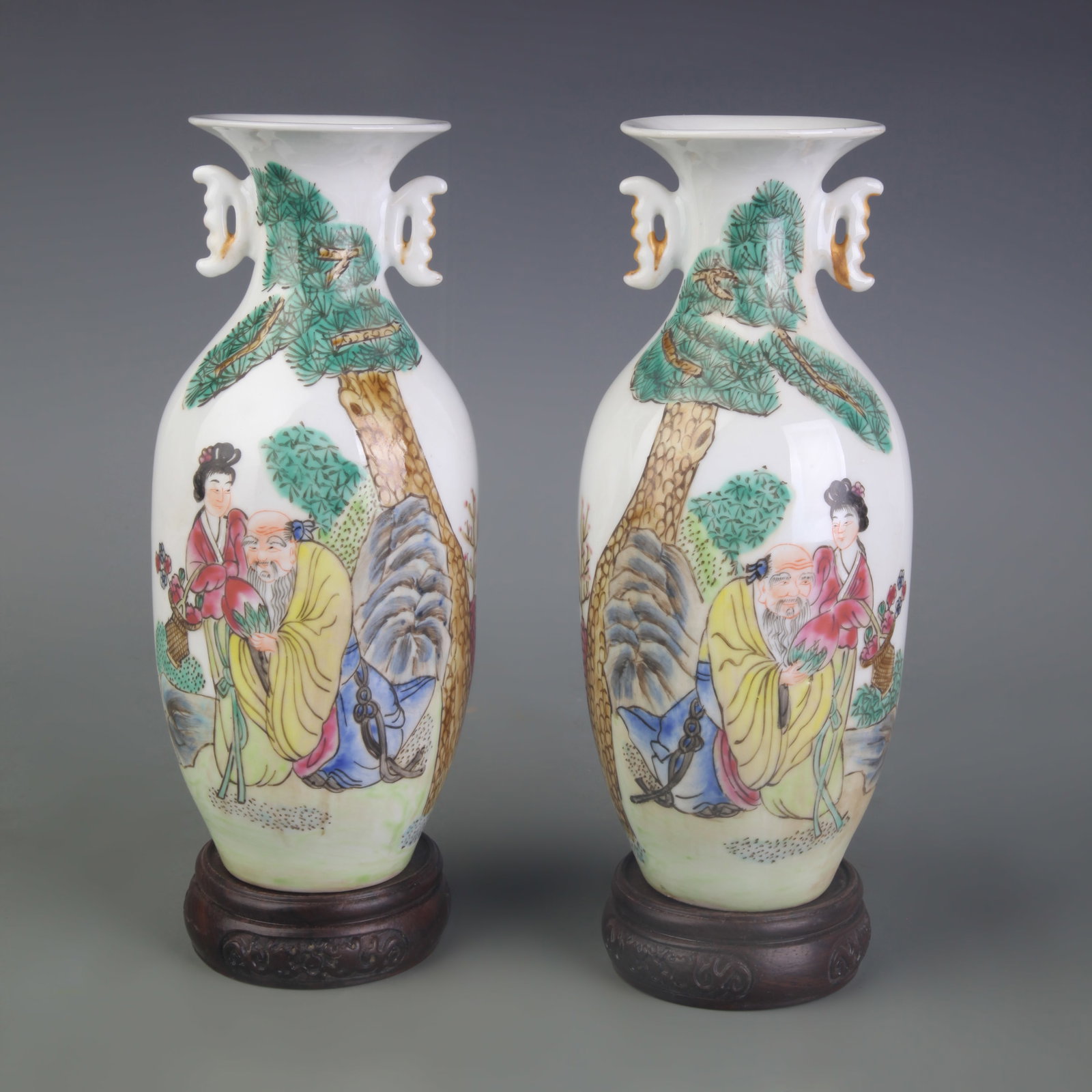 PAIR OF FAMILLE ROSE DOUBLE-HANDLED VASES WITH FIGURAL DECORATION: Qing Dynasty Guan Xu Style; Diameter: 2.8inch; High: 8.5inch;;Wooden base for picture and display only.