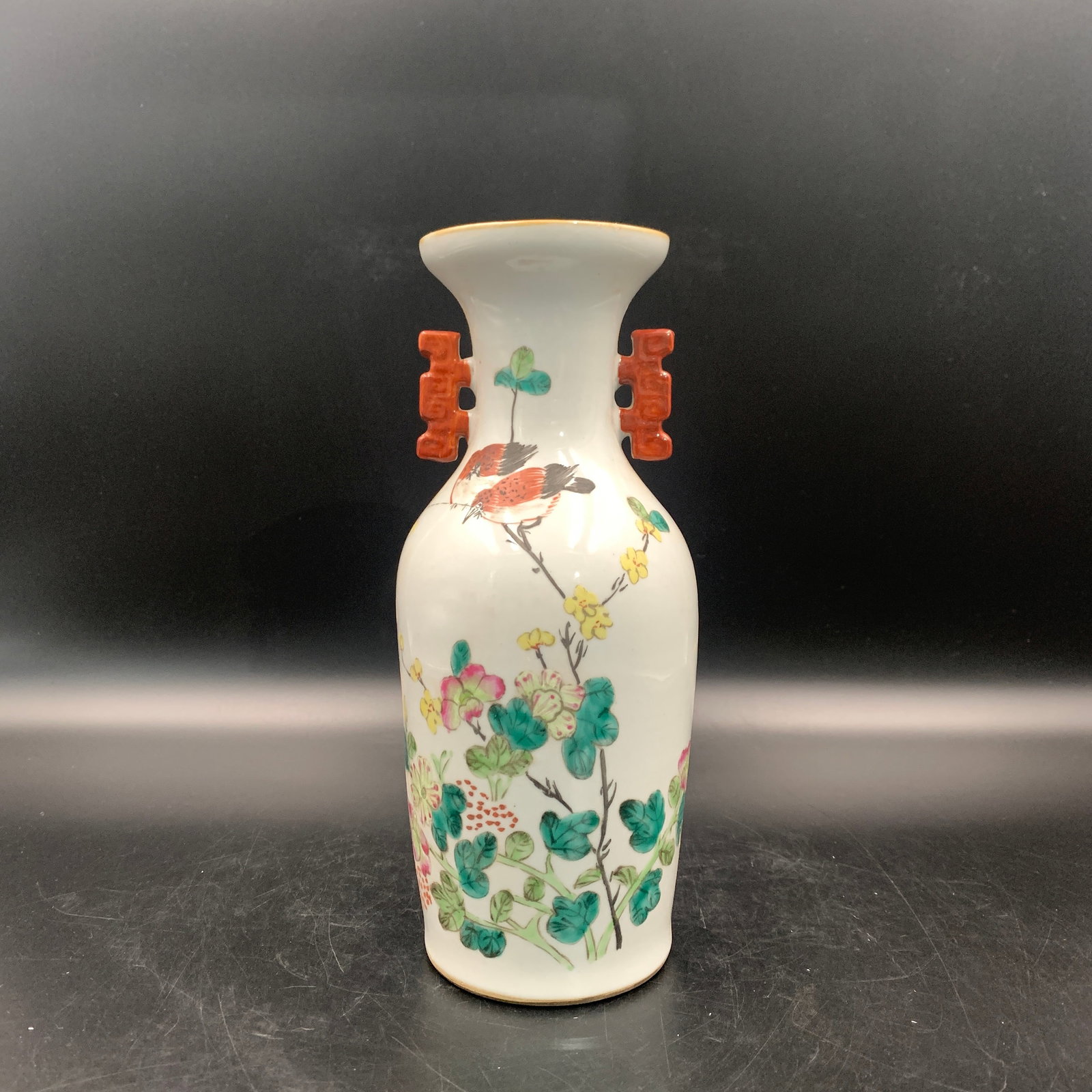 FAMILLE ROSE "BIRDS AND FLOWERS" VASE WITH STYLIZED HANDLES: Qing Dynasty; High: 9.8 inch; Diameter: 4.2 inch; ;Wooden base for picture and display only.
