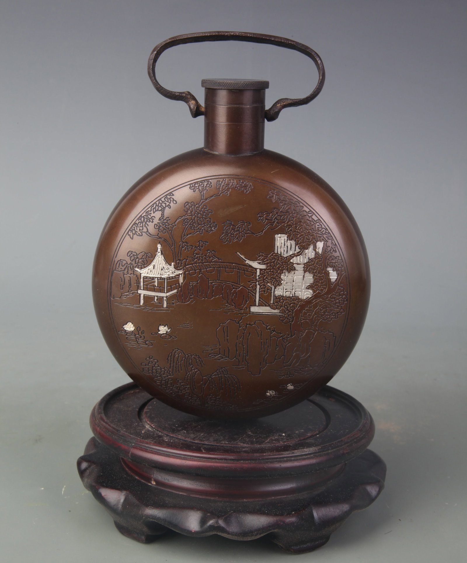 A COPPER WINE EWER INLAID WITH SILVER AND FIGURAL NARRATIVE DECORATION: Qing Dynasty; Width: 4.5 inch; High: 6.1 inch ;Wooden base for picture and display only.