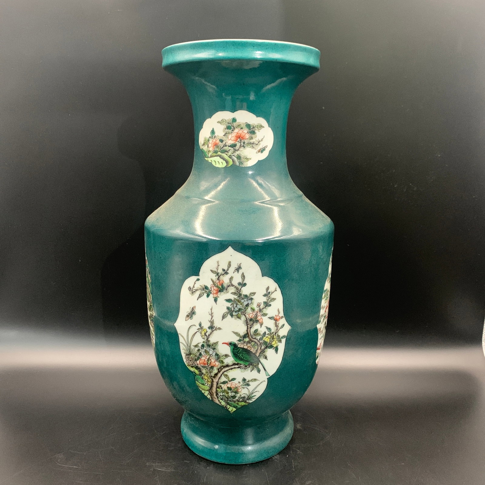 TEAL-GROUND FAMILLE ROSE BALUSTER PORCELAIN VASE: Qing Dynasty; High: 15.5 inch; Diameter: 7.7 inch; ;Wooden base for picture and display only.