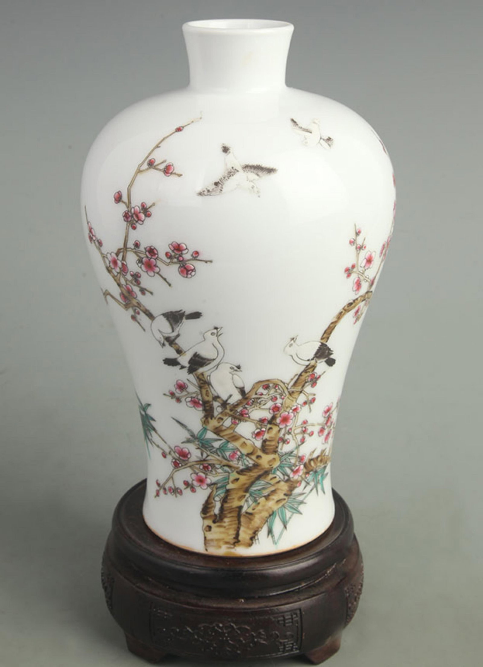 FAMILLE CLOISONNE ENAMEL MAGPIES ON PLUM TREE PORCELAIN VASE: Qing Dynasty Yong Zheng Period; High: 9.00 inch; Width: 4.50 inch; ;Wooden base for picture and display only.