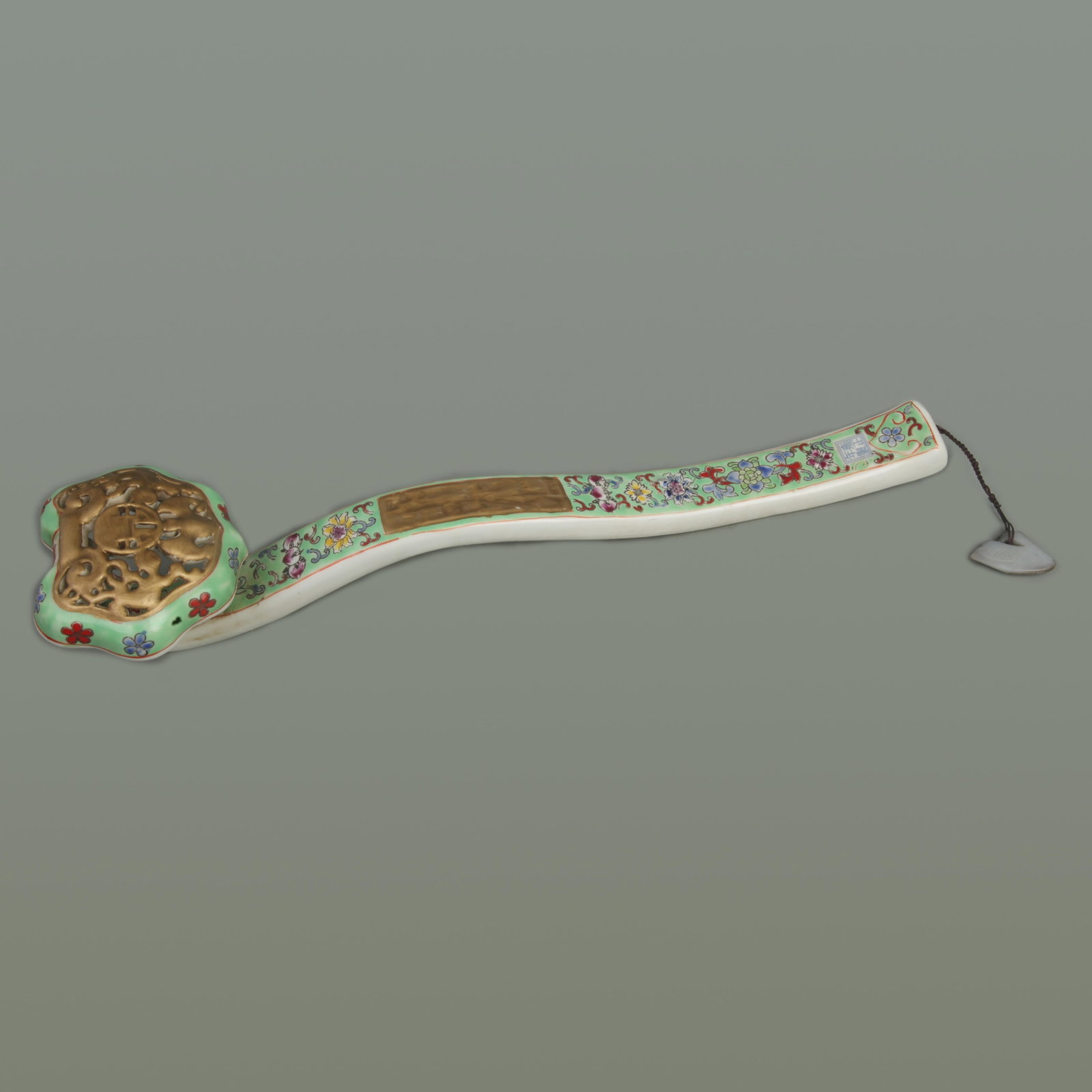 RARE FAMILLE ROSE GREEN GROUND PORCELAIN RUI YI: Qing Dynasty Yong Zheng Period; Long: 17.0 inch; High: 4.50 inch; ;Wooden base for picture and display only.