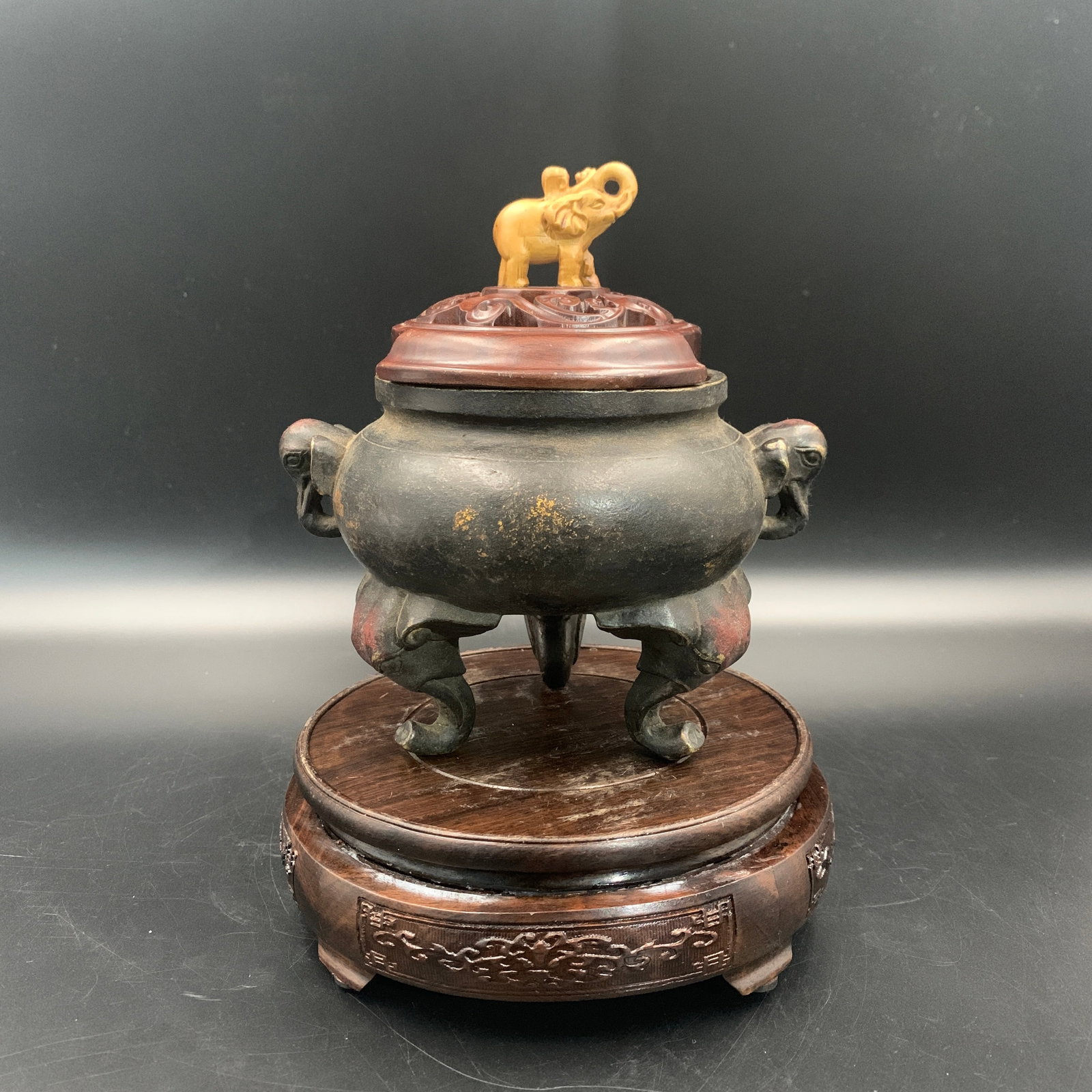 CHINESE BRONZE ELEPHANT-TRUNK TRIPOD CENSER: Qing Dynasty; Long: 6.2 inch; Width: 5 inch; High: 6.6 inch; ;Wooden base for picture and display only.