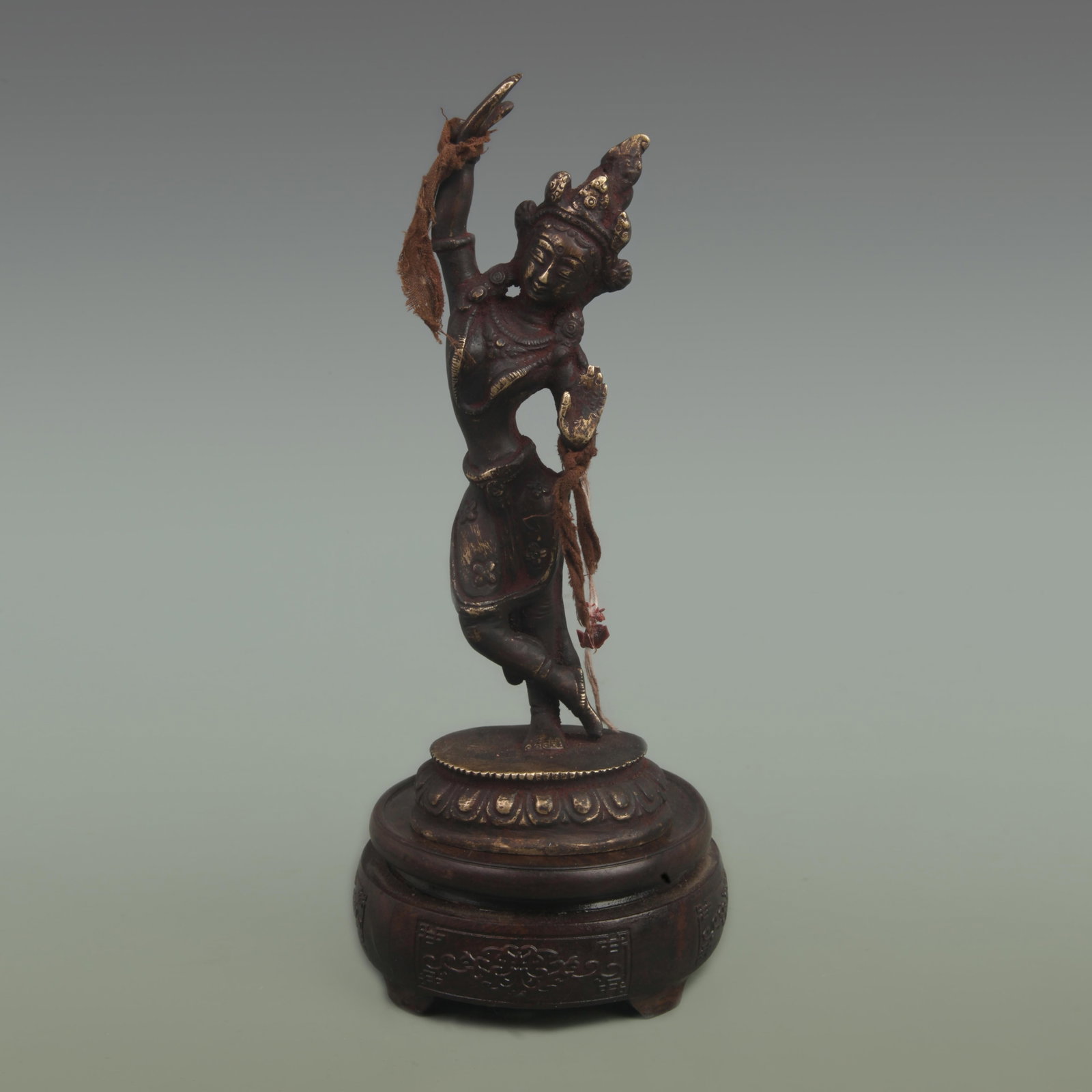TIBETAN BUDDHIST BRONZE BUDDHA STATUE: Qing Dynasty; High: 8.3 inch; Width: 3.1 inch; ;Wooden base for picture and display only.