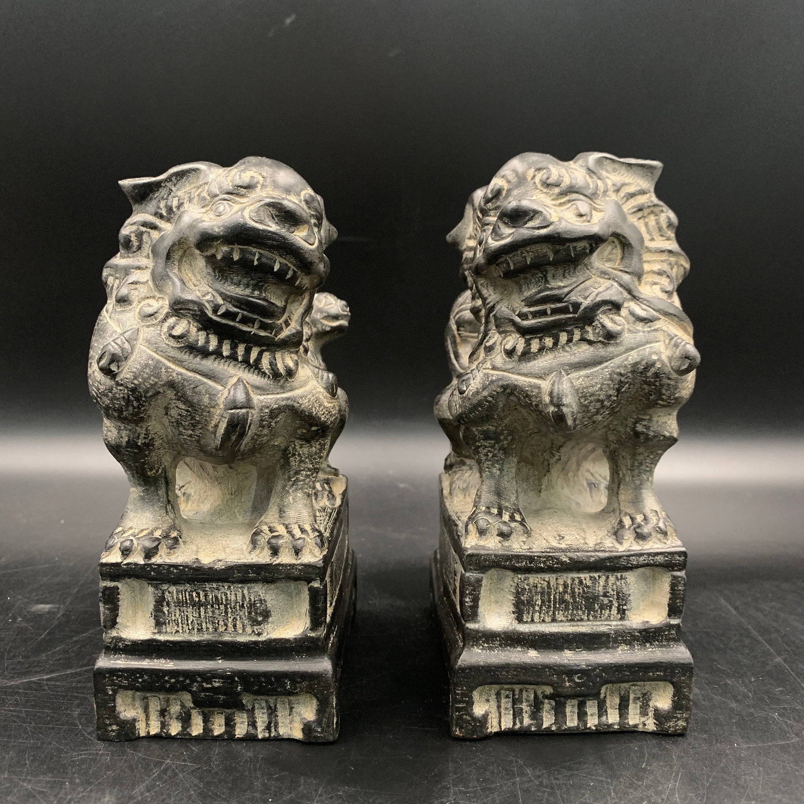 PAIR OF CARVED STONE CHINESE GUARDIAN LIONS (FOO DOGS): Republic Period; Long: 3.7 inch; Width: 2.8 inch; High: 6.7 inch; ;Wooden base for picture and display only.