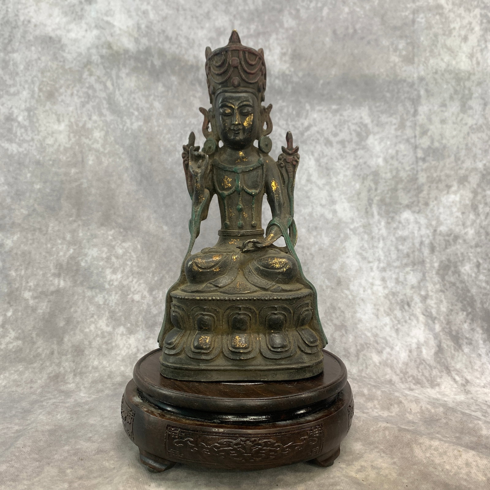 GILT-BRONZE CROWNED BODHISATTVA STATUE: Qing Dynasty; Long: 4.5 inch; Width: 3.5 inch; High: 9.5 inch; ;Wooden base for picture and display only.