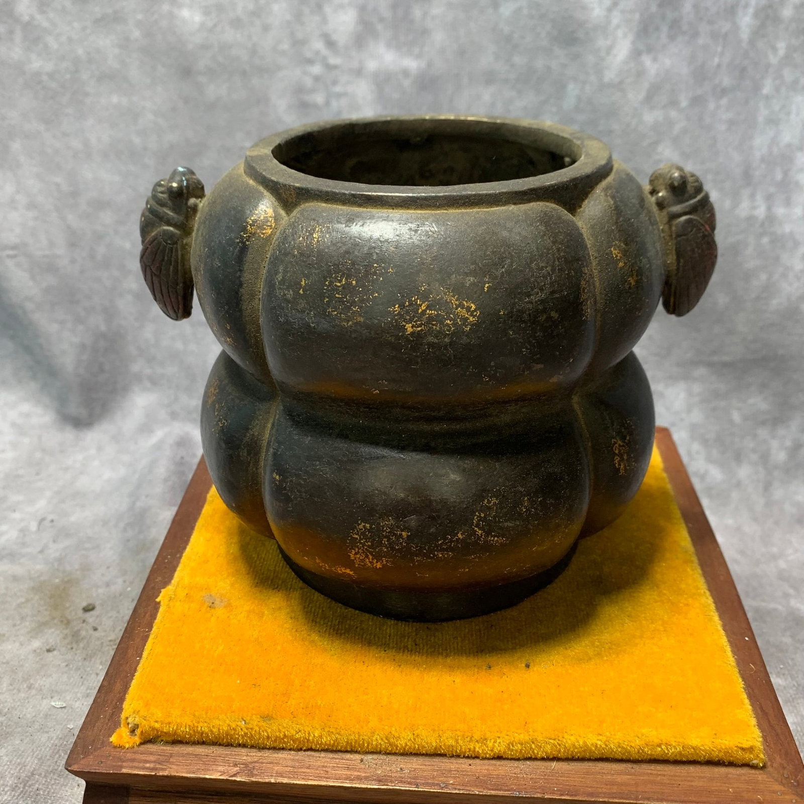 GILT-BRONZE MELON-SHAPED INCENSE BURNER WITH CICADA-SHAPED HANDLES: Ming Dynasty Style: High: 6.6 inch; Diameter: 4.9 inch ;Wooden base for picture and display only.