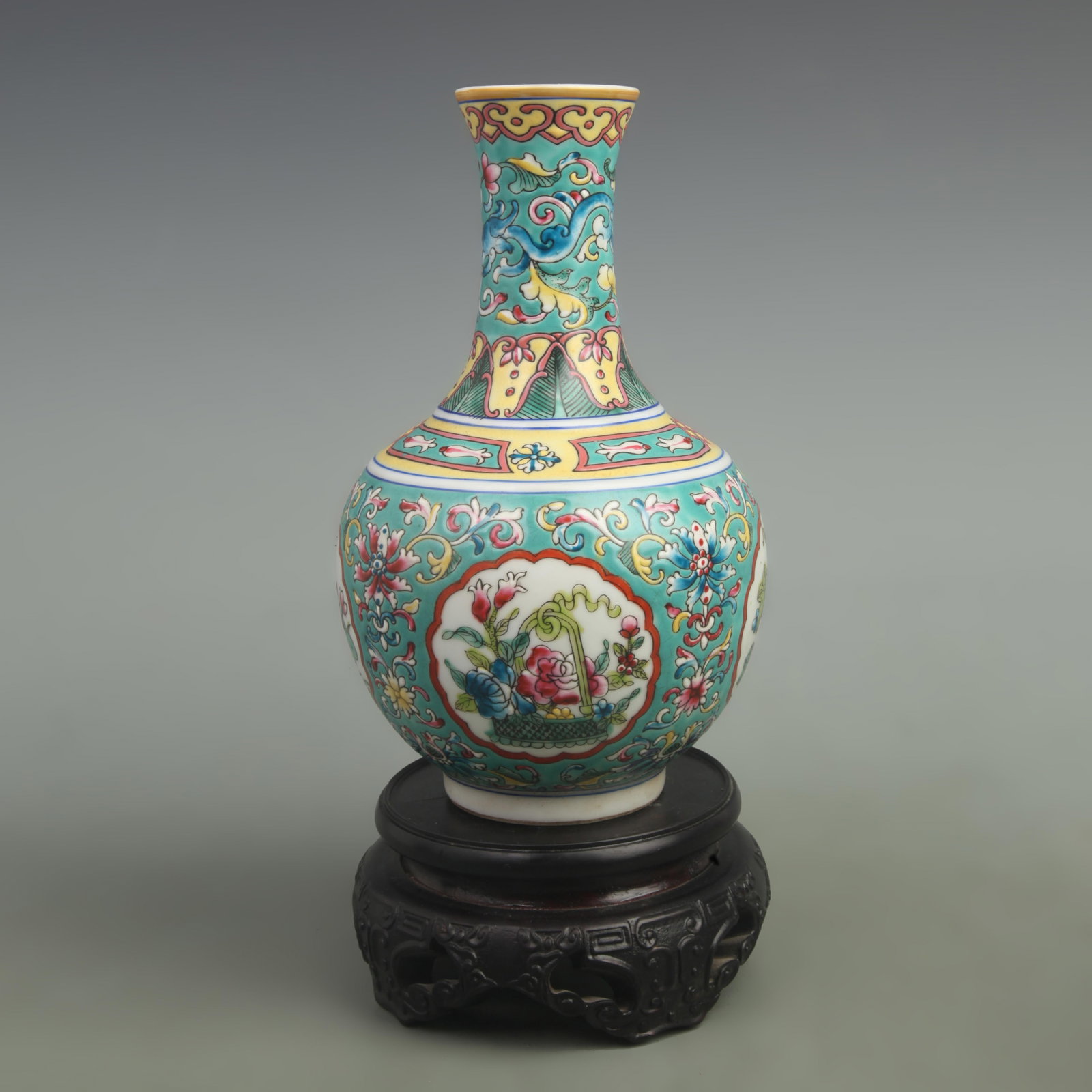 FAMILLE ROSE ENAMEL COLOR FLOWER PATTERN PORCELAIN VASE: Qing Dynasty Yong Zheng Period; High: 9.5 inch Width: 6 inch ;Wooden base for picture and display only.