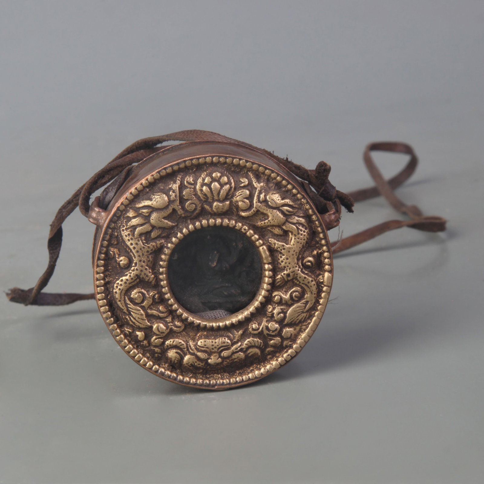TIBETAN BUDDHISM GAU BOX PENDANT: Qing Dynasty; Diameter: 2.1 inch; ;Wooden base for picture and display only.
