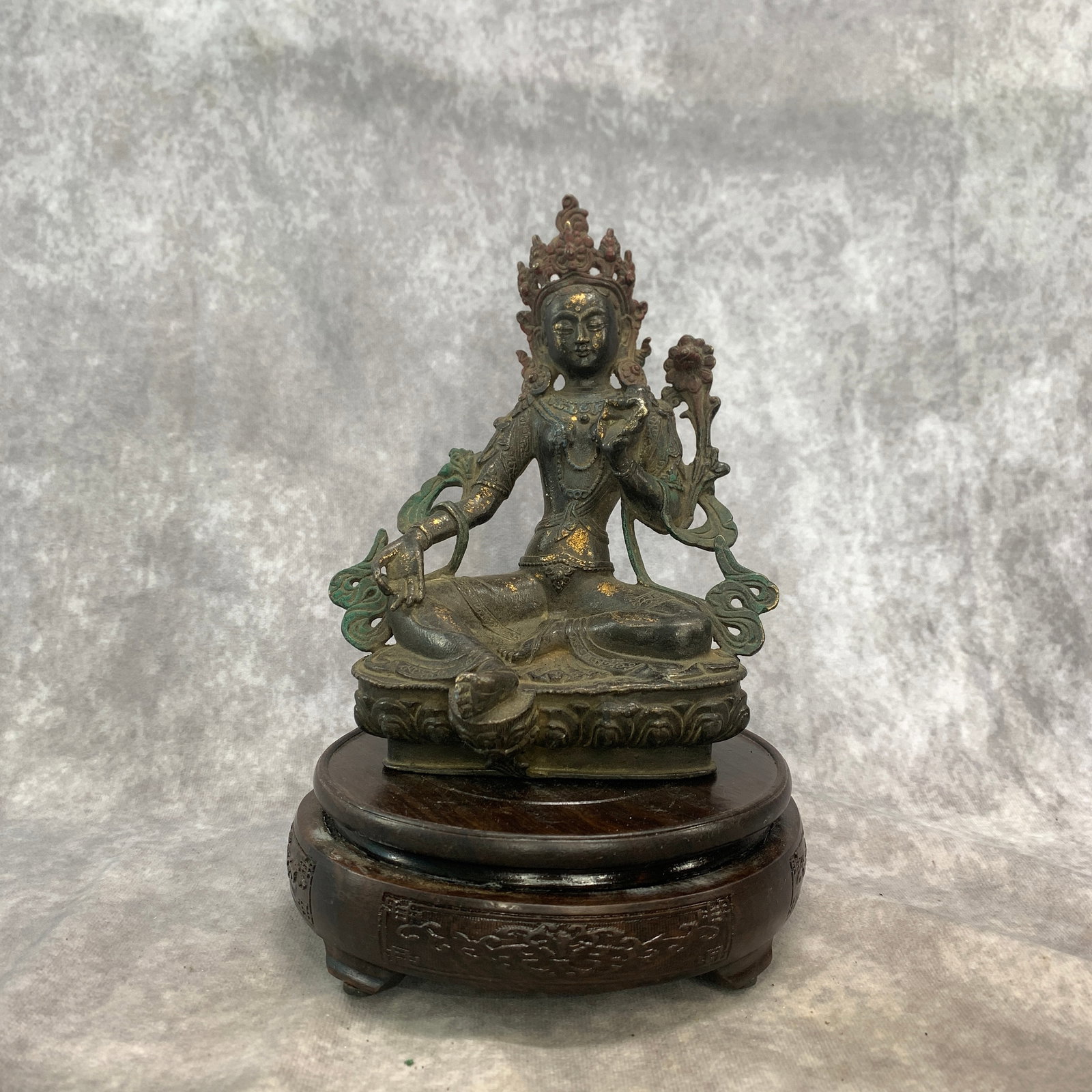 TIBETAN GILT-BRONZE GREEN TARA STATUE: Ming Dynasty Style; Long: 5.9 inch; Width: 3.9 inch; High: 7.9 inch; ;Wooden base for picture and display only.