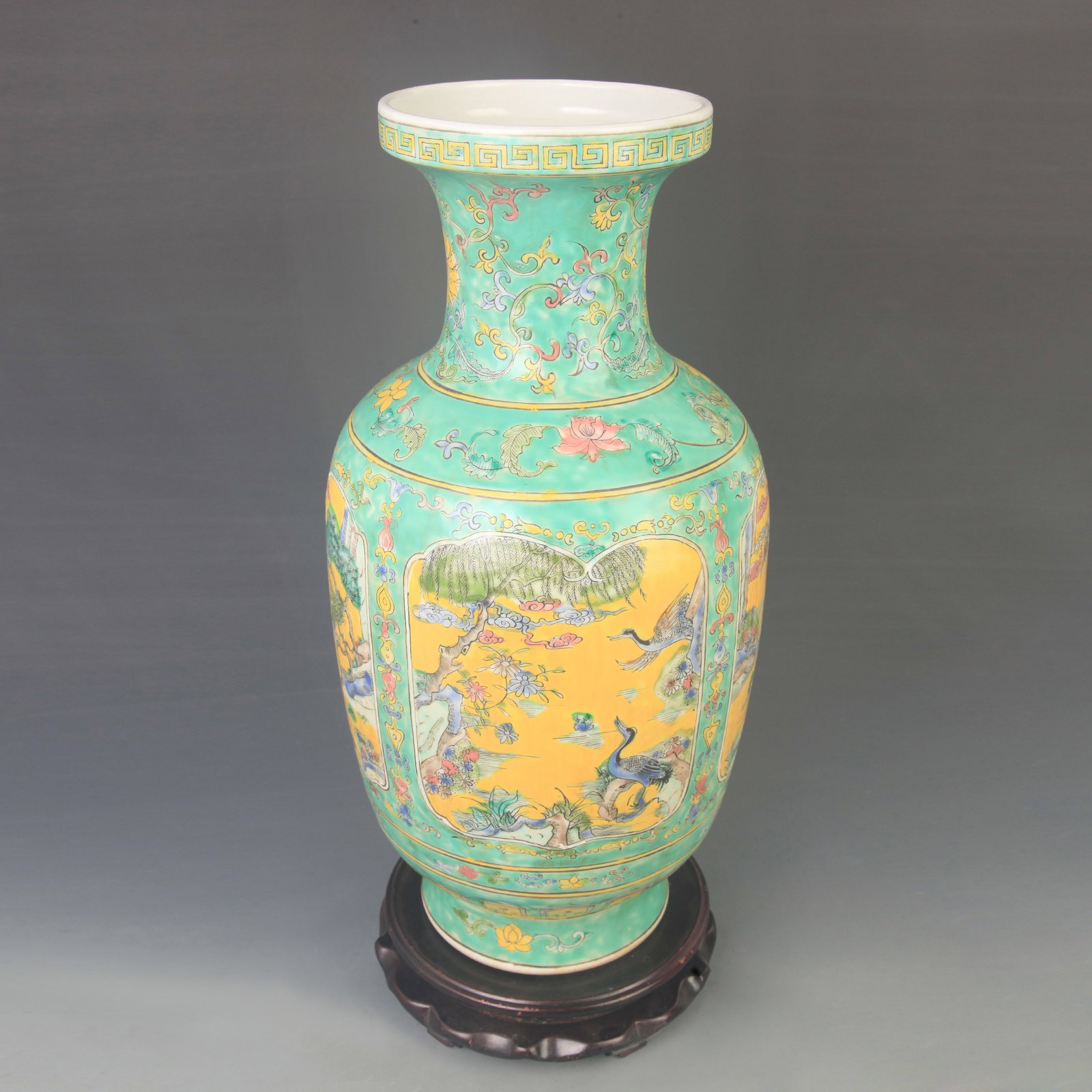 LARGE GREEN-GROUND FAMILLE ROSE VASE WITH ANIMAL DECORATION: Qing Dynasty Kang Xi Period; High: 17.0 inch; Diameter:8.00 inch ;Wooden base for picture and display only.