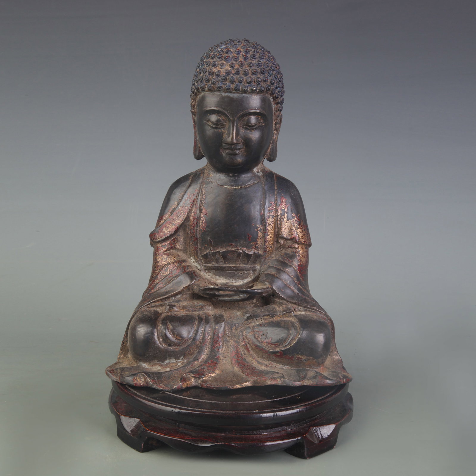 A FINE BRONZE SHAKYAMUNI BUDDHA FIGURE: Qing Dynasty; Width: 6.8inch; High: 9.4inch ;Wooden base for picture and display only.