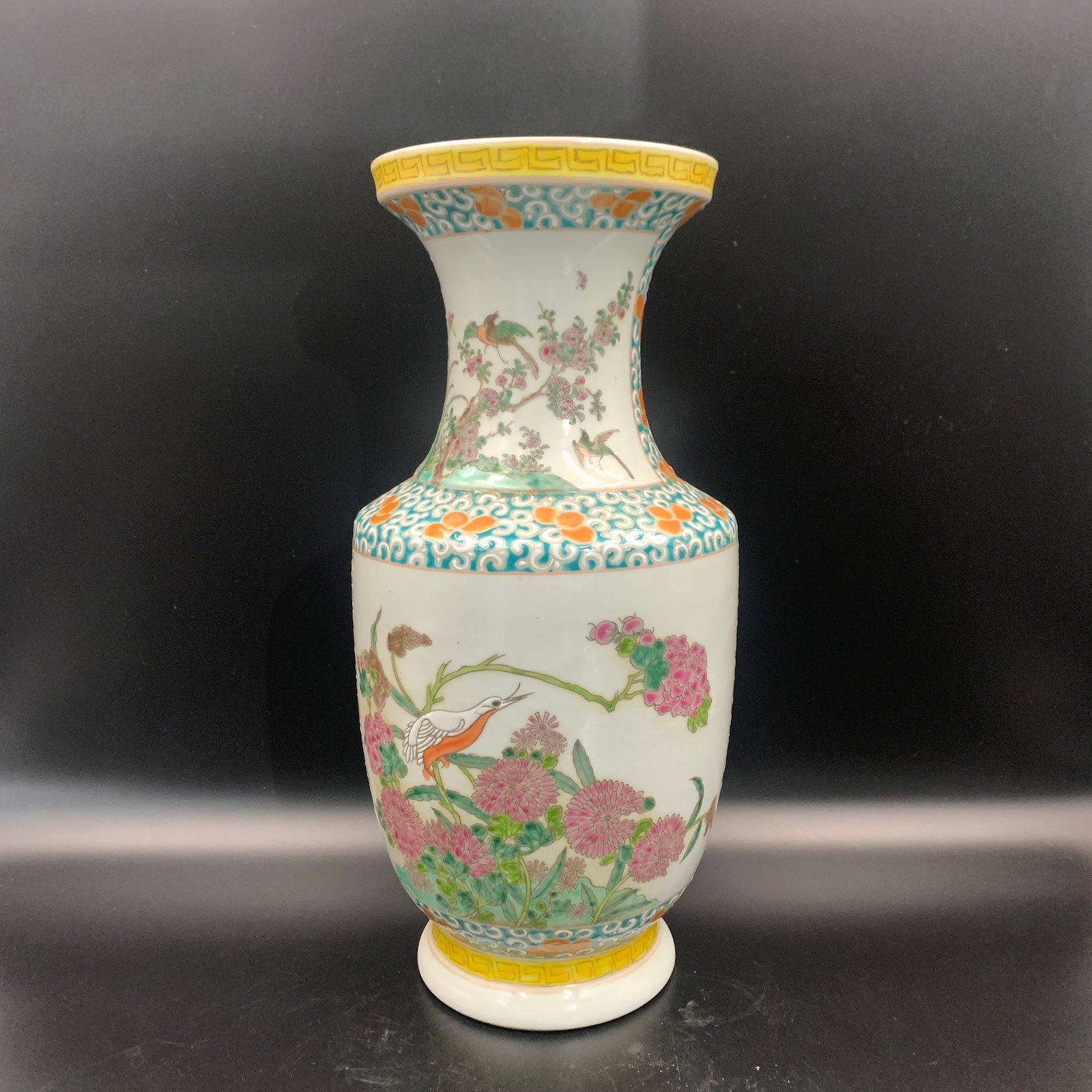 FAMILLE ROSE "BIRDS AND FLOWERS" ROULEAU PORCELAIN VASE: Qing Dynasty; High: 16 inch; Diameter: 7.7 inch; ;Wooden base for picture and display only.