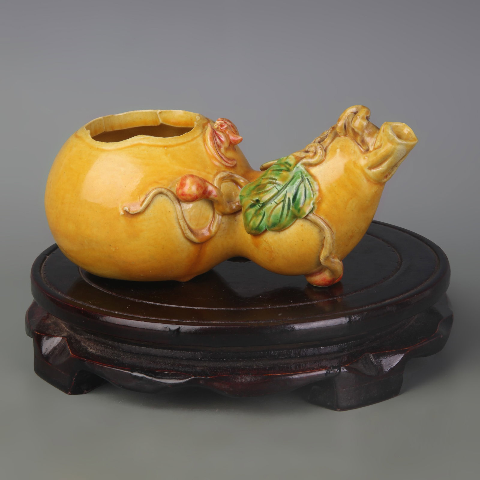 YELLOW-GLAZED BRUSH WASHER WITH CARVED LONGEVITY AND BLESSING MOTIFS: Qing Dynasty Qian Long Period; Width: 6.2inch; High: 2.7inch ;Wooden base for picture and display only.