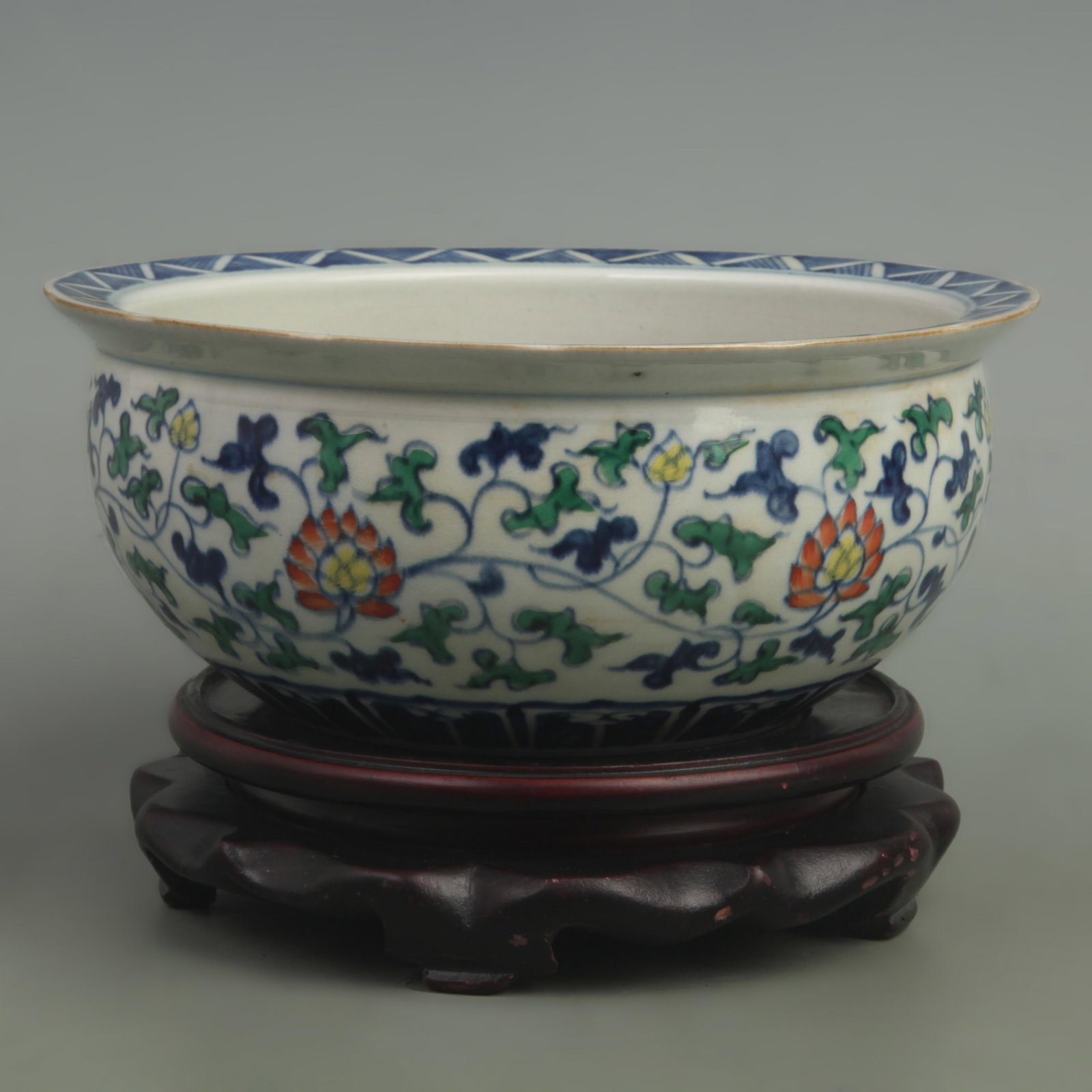 DOUCAI DRAGON PATTERNED TANGLED LOTUS PAINTED PORCELAIN BOWL: Ming Dynasty Style Wan Li Period: High: 3.4 inch; Diameter: 8.5 inch ;Wooden base for picture and display only.