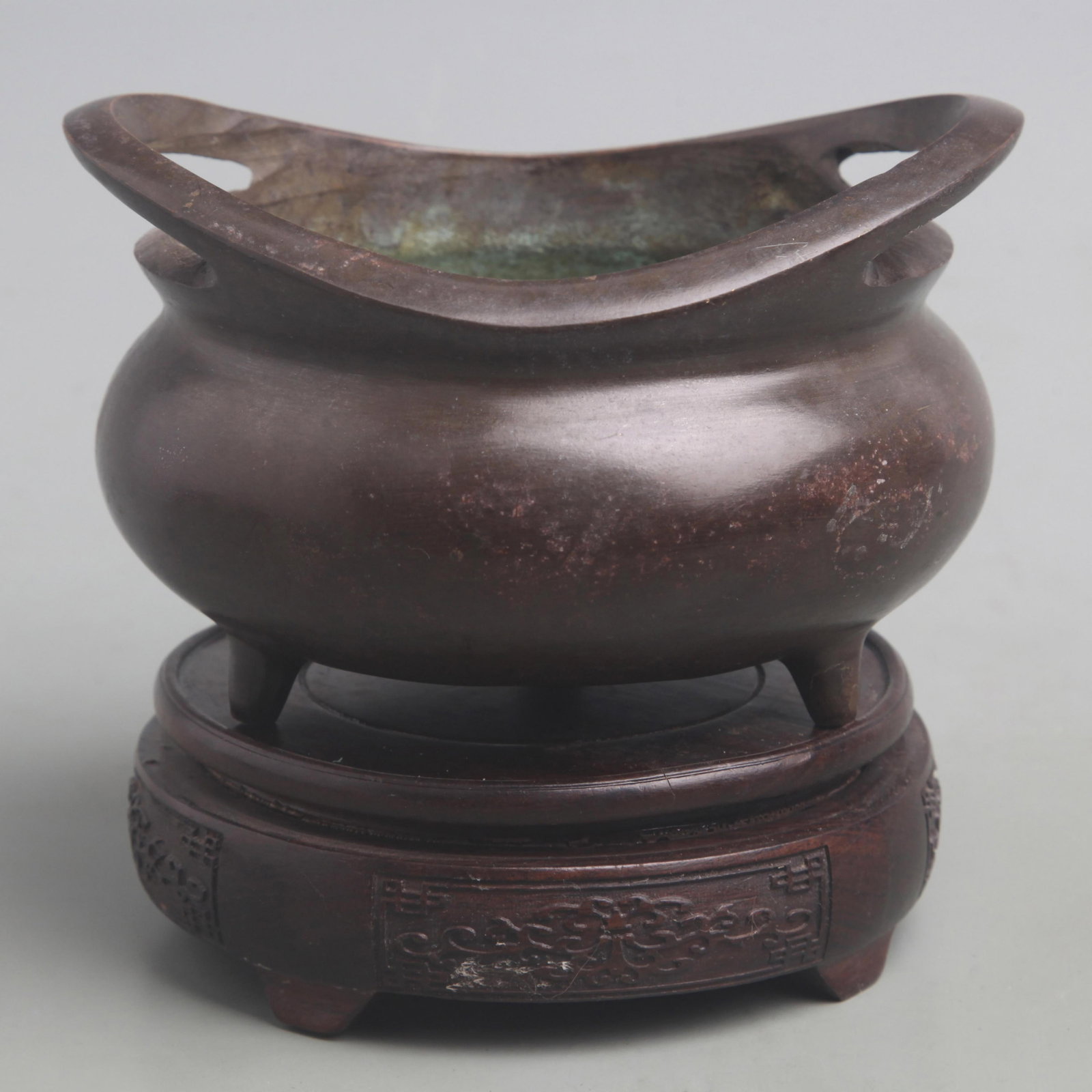 A FINE BRONZE THREE FOOT CENSER: Qing Dynasty; Diameter: 6.2 inch; High: 4 inch; ;Wooden base for picture and display only.
