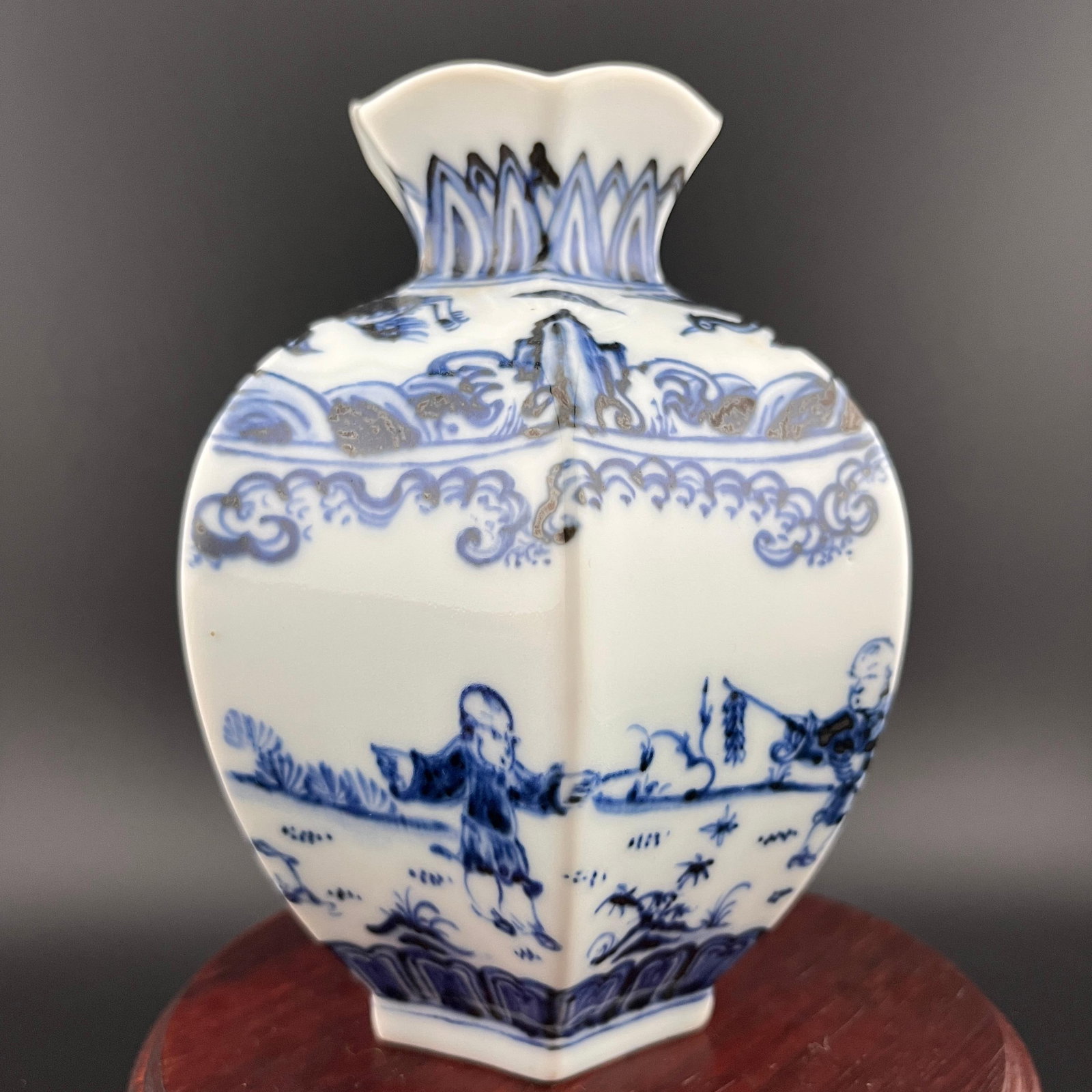BLUE AND WHITE "BOYS AT PLAY" SMALL BOTTLE: Republic Period; High: 5.2 inch; Diameter: 4.2 inch; ;Wooden base for picture and display only.