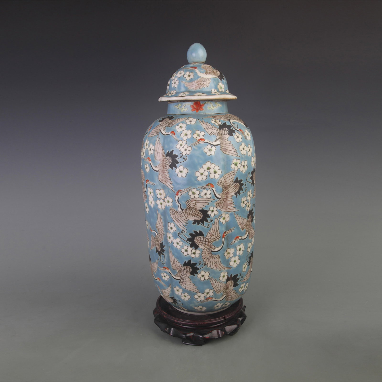 BLUE GROUND CRANE PATTERN GENERAL STYLE PORCELAIN JAR WITH LID: Qing Dynasty Kangxi Period; Diameter: 3.9 inch High: 18.0 inch ;Wooden base for picture and display only.