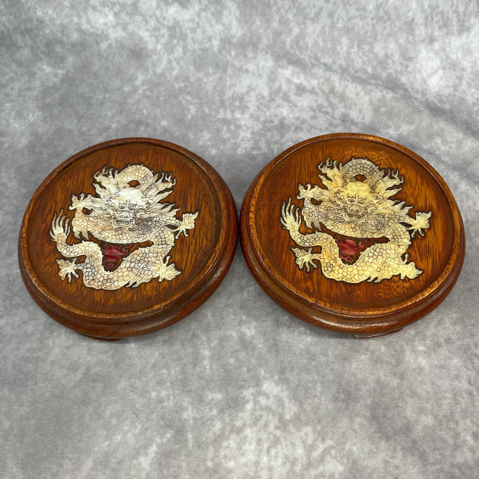 PAIR OF ROSEWOOD DISPLAY STAND INLAY WITH MOTHER-OF-PEARL: Modern; High: 0.94 inch; Diameter: 5.38 inch; ;Wooden base for picture and display only.