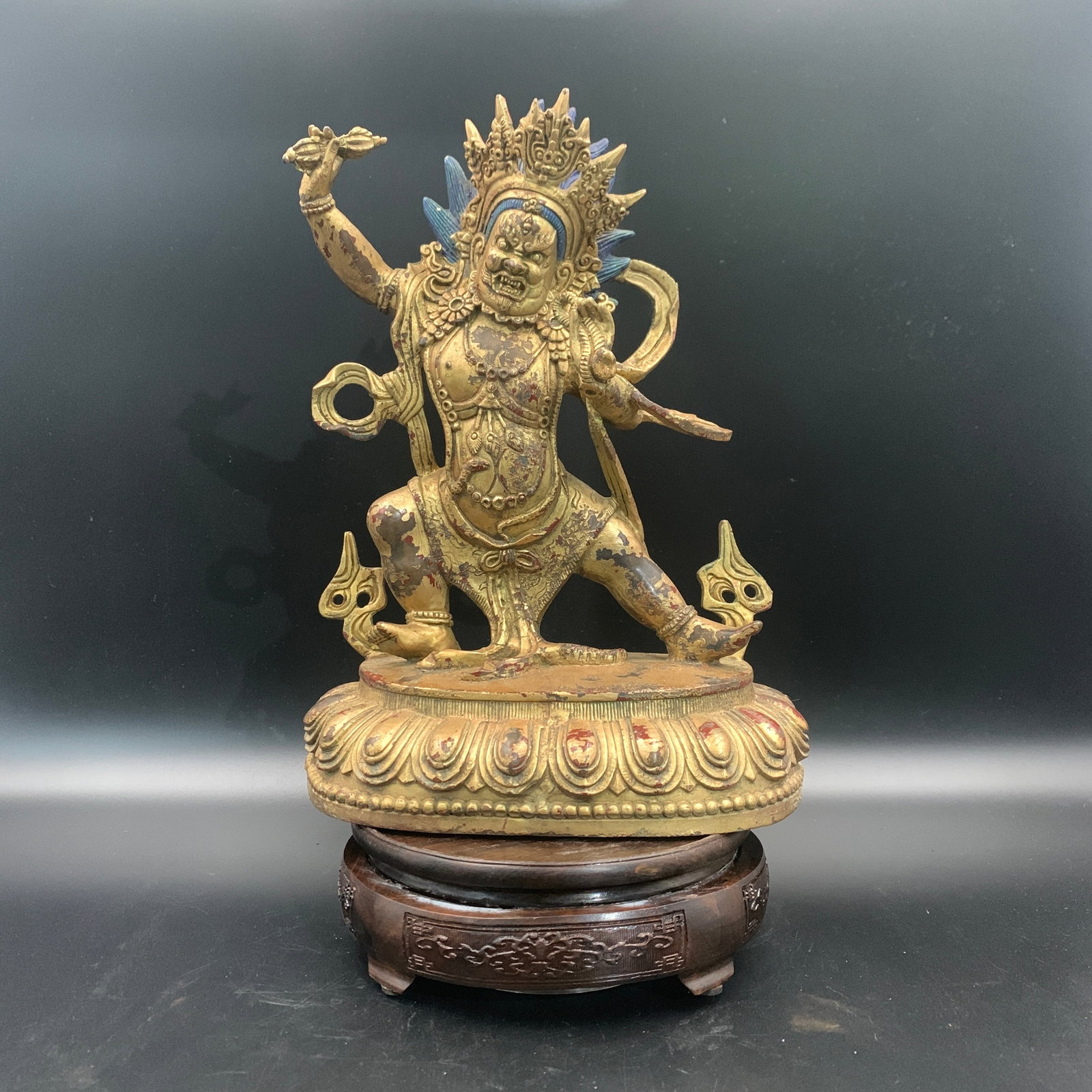 TIBETAN GILT-BRONZE VAJRAPANI STATUE: Qing Dynasty; Long: 8.2 inch; Width: 4 inch; High: 10.7 inch; ;Wooden base for picture and display only.