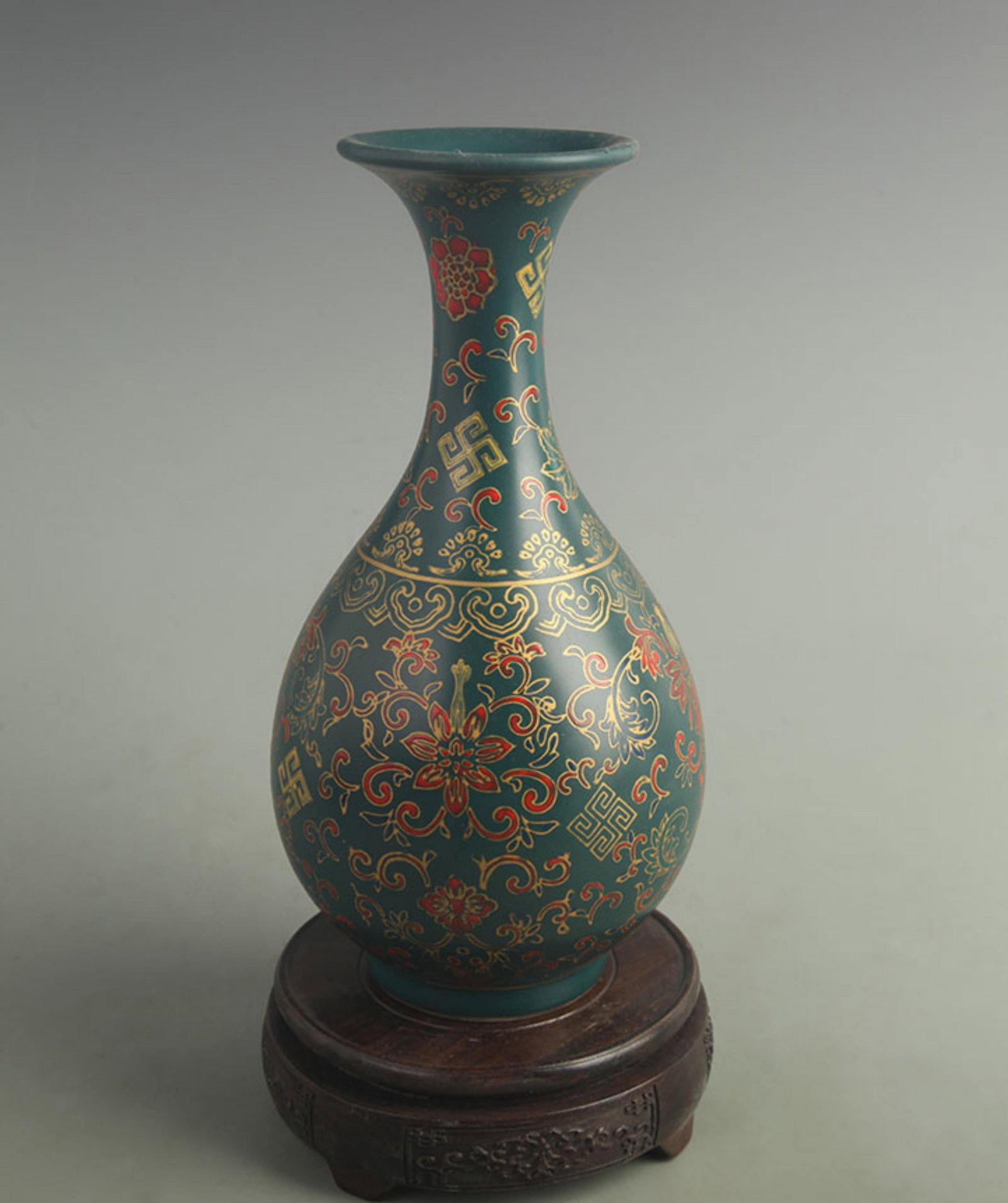 DARK GREEN GLAZED YUHUCHUN PORCELAIN VASE WITH FLORAL PATTERN: Qing Dynasty Yong Zheng Period; High: 10.0 inch Width: 5.00 inch ;Wooden base for picture and display only.