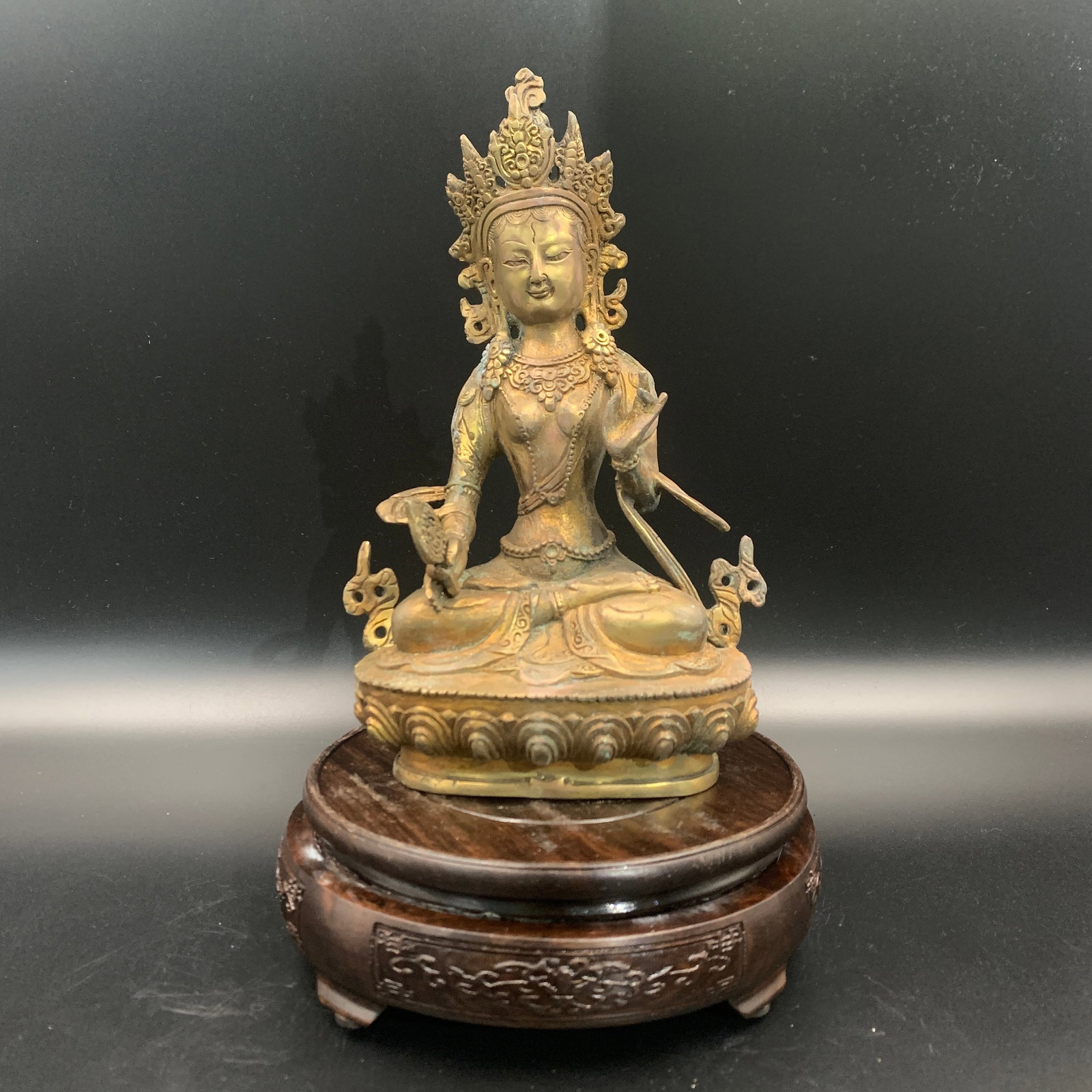 A FINE BRONZE GREEN TARA (SYAMATARA) STATUE: Qing Dynasty; Long: 5.3 inch; Width: 3.4 inch; High: 8.7 inch; ;Wooden base for picture and display only.