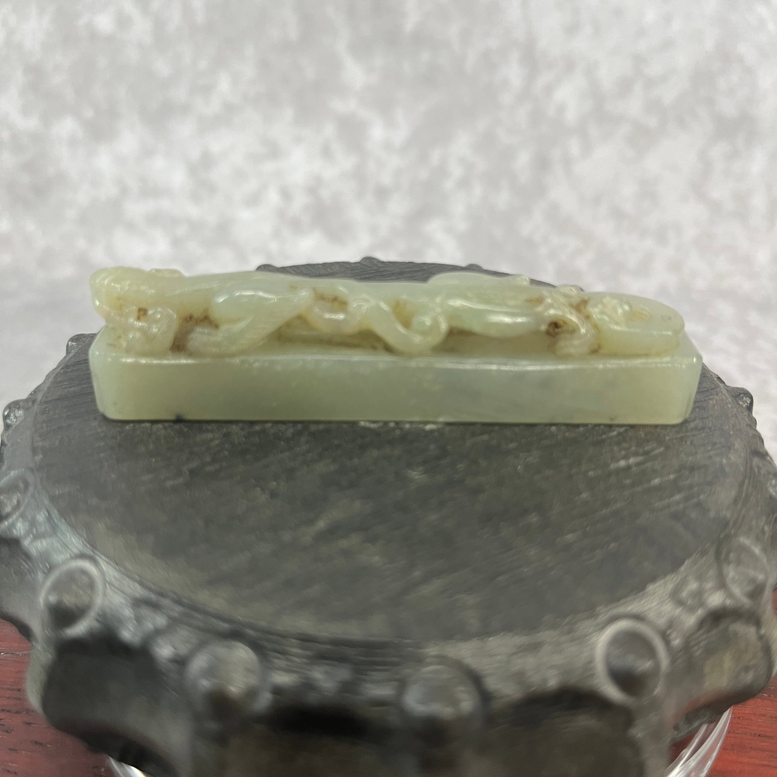 CARVED JADE DECORATED WITH A DRAGON AND CHILONG: Qing Dynasty; Long: 3.08 inch; Width: 0.5 inch; High: 0.7 inch;;Wooden base for picture and display only.