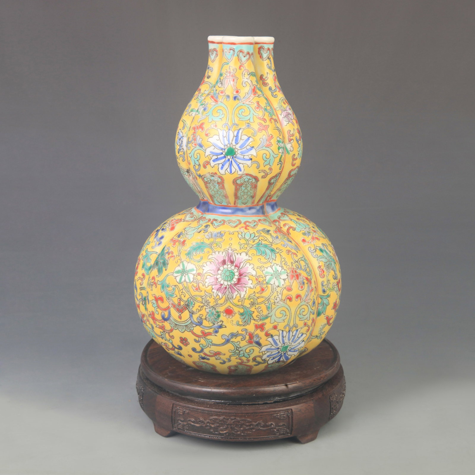 YELLOW GROUND WITH POLYCHROME THREE-TUBE VASE: Qing Dynasty Qian Long Period; High: 10.0 inch; Diameter: 6.50 inch; ;Wooden base for picture and display only.