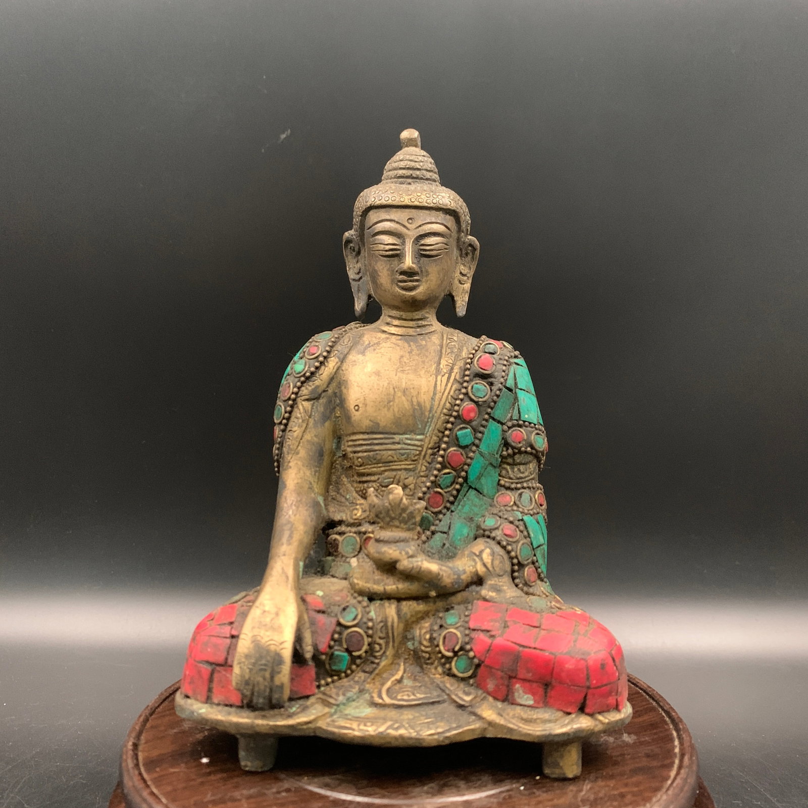 A FINE BRONZE GEM-INLAID BHAISAJYAGURU (MEDICINE BUDDHA): Qing Dynasty; Long: 4.7 inch; Width: 3 inch; High: 6.9 inch; ;Wooden base for picture and display only.