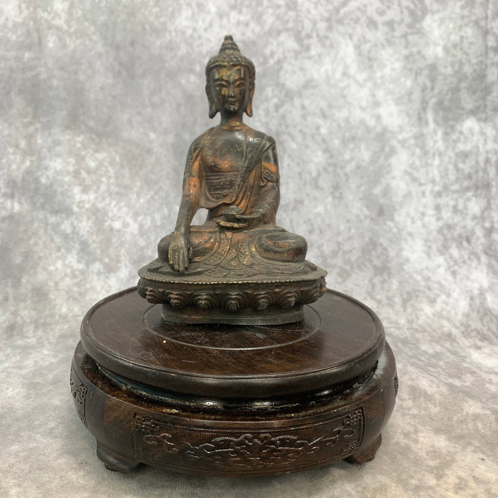A SMALL SHAKYAMUNI BUDDHA STATUE: Qing Dynasty; Long: 3.6 inch; Width: 2.7 inch; High: 5.8 inch; ;Wooden base for picture and display only.