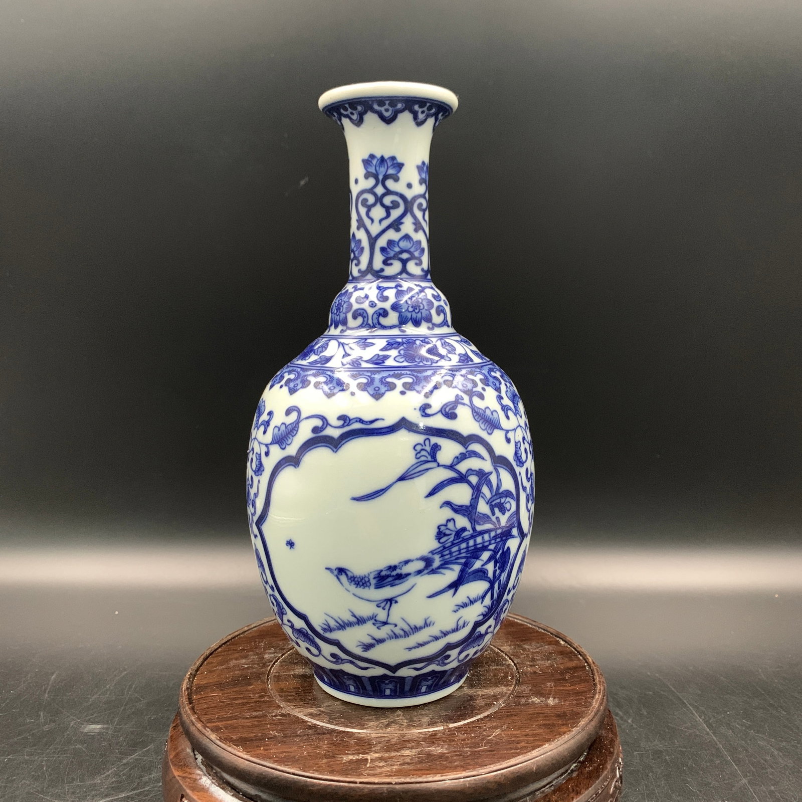 BLUE AND WHITE GARLIC-MOUTH PORCELAIN VASE (SUANTOUPING): Qing Dynasty; Long: 4.1 inch; Width: 4.1 inch; High: 8.3 inch; Diameter: 4.1 inch; ;Wooden base for picture and display only.