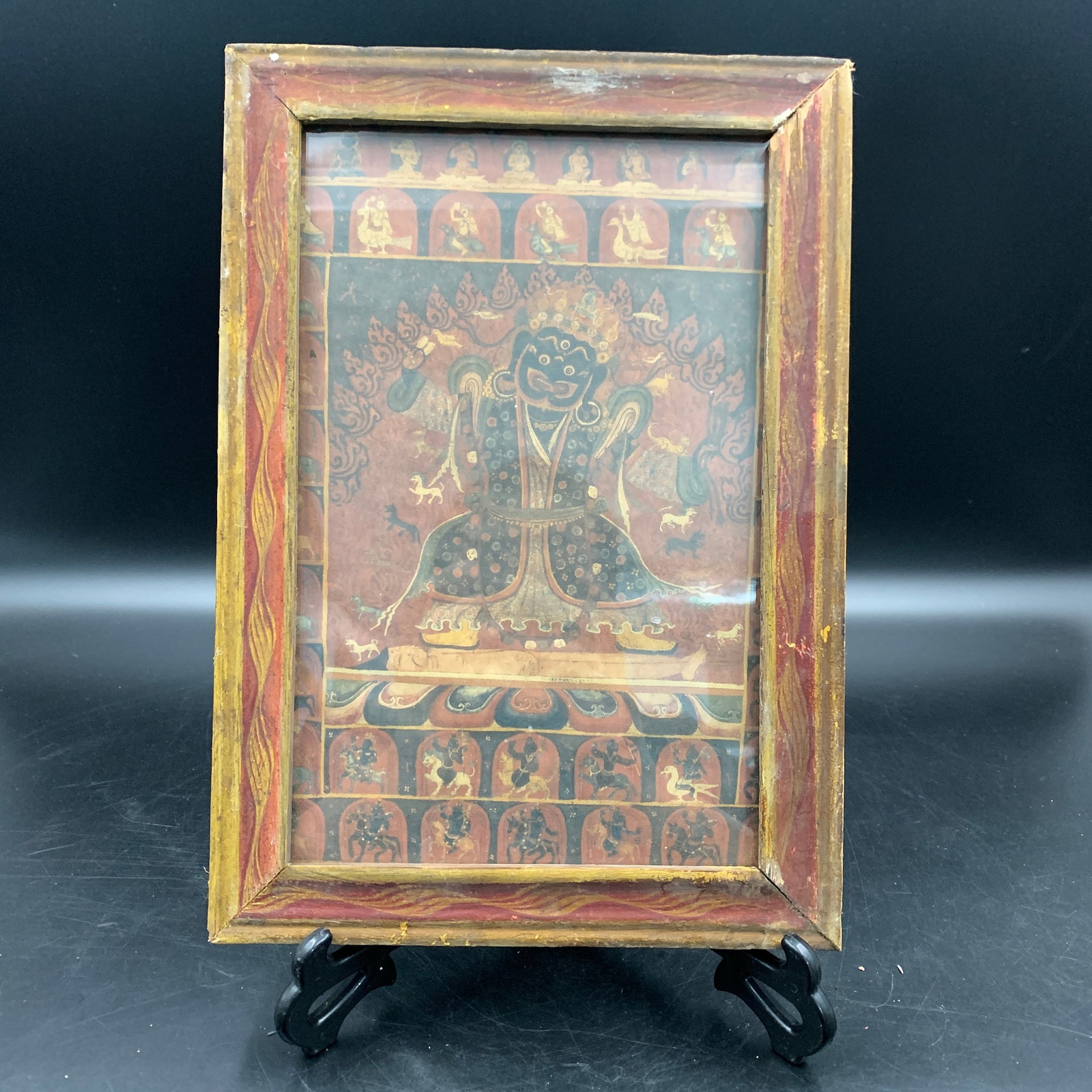 A WOOD FRAME WRATHFUL PROTECTOR DEITY PAINTING: Modern; Long: 12 inch; Width: 8.4 inch; High: 0.6 inch; ;Wooden base for picture and display only.