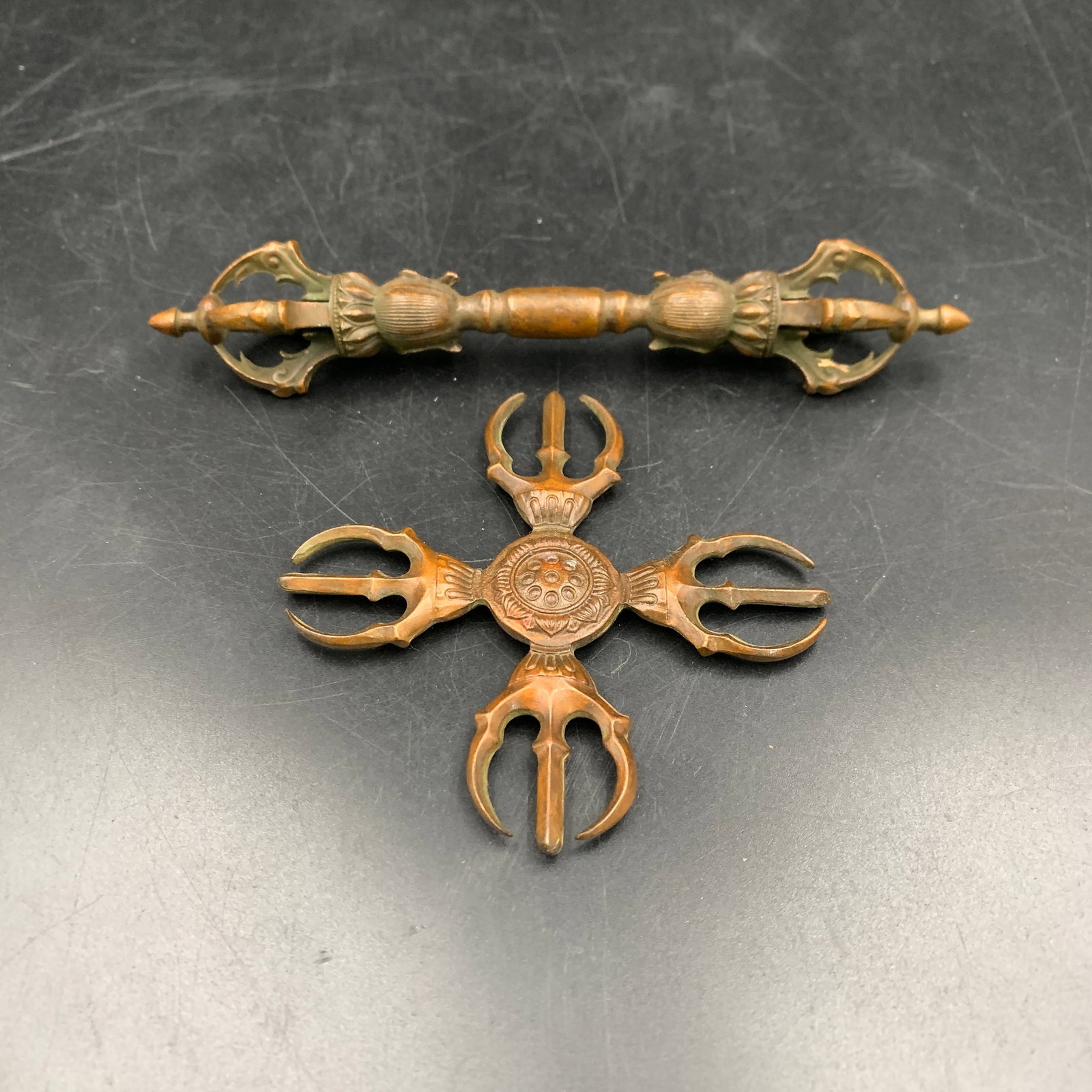 A TIBETAN BUDDHIST RITUAL VAJRA (DORJE): Republic Period; Long: 2.9 inch; Width: 2.9 inch; High: 0.3 inch; Long: 6.3 inch; Diameter: 1.1 inch; ;Wooden base for picture and display only.