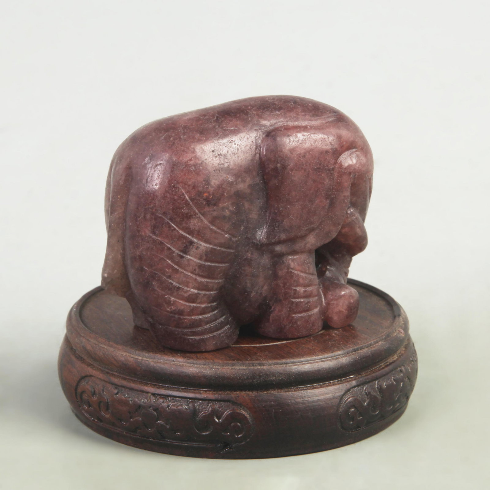 A RARE TOURMALINE MADE SMALL ELEPHANT ORNAMENT: Qing Dynasty; High: 2.4 inch; Width: 1.6 inch; Long:3.0 inch ;Wooden base for picture and display only.