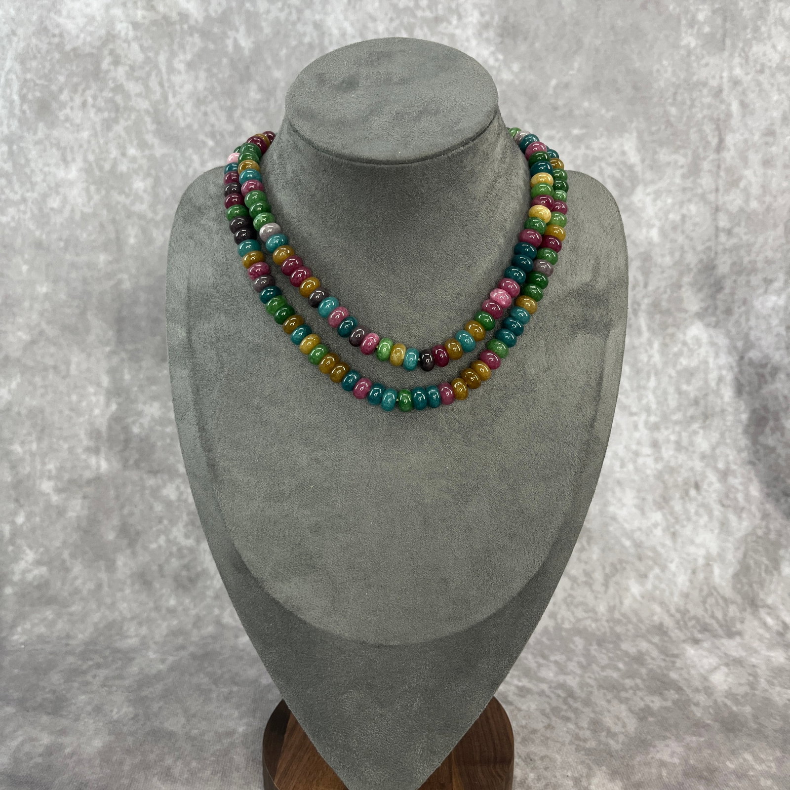 A FINE MULTICOLOR TOURMALINE MADE NECKLACE: Modern; Long: 15.5 inch; Diameter: 0.32 inch;;Wooden base for picture and display only.