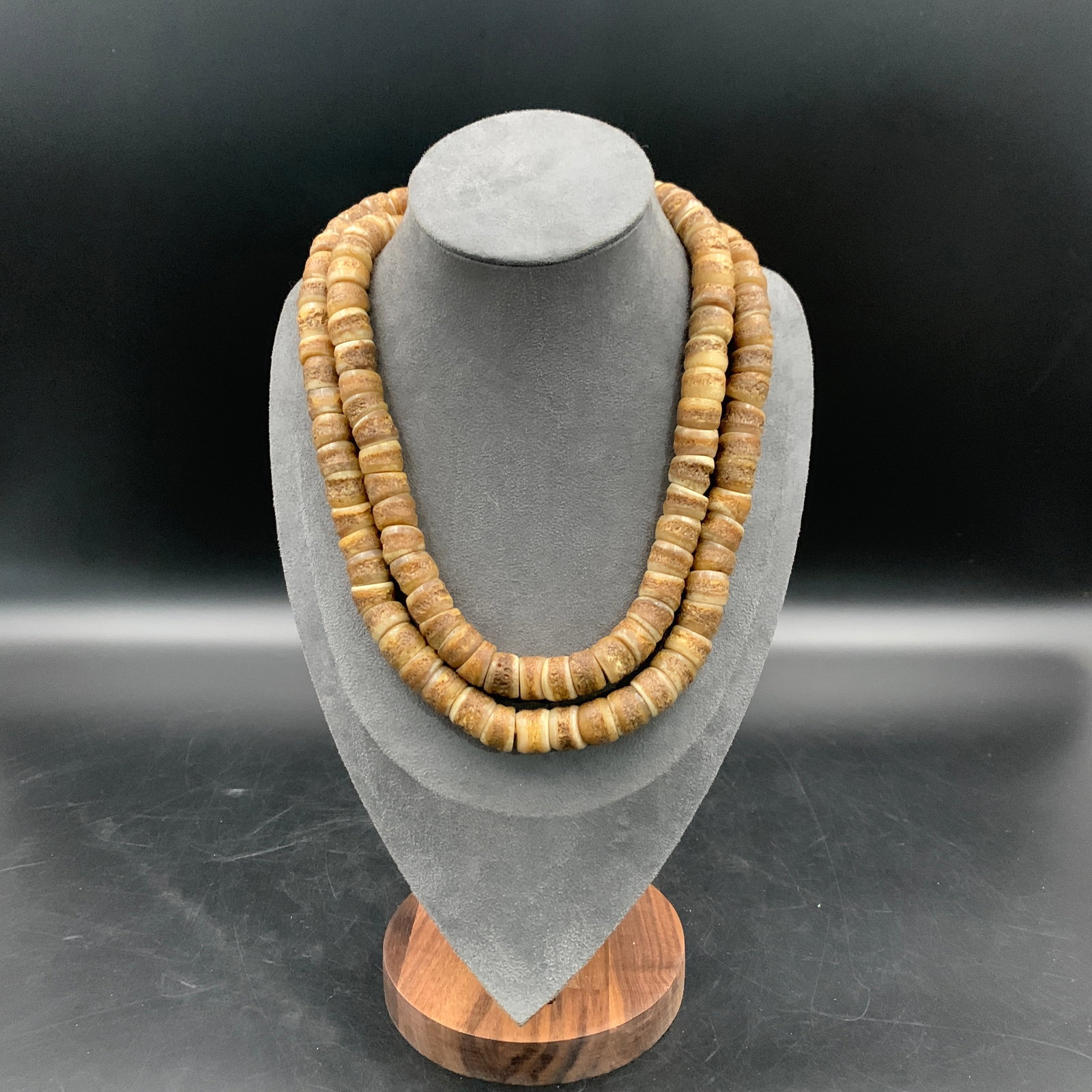 TIBETAN HORN DISC MALA NECKLACE: Modern; Long: 20 inch; Diameter: 0.5 inch; ;Wooden base for picture and display only.