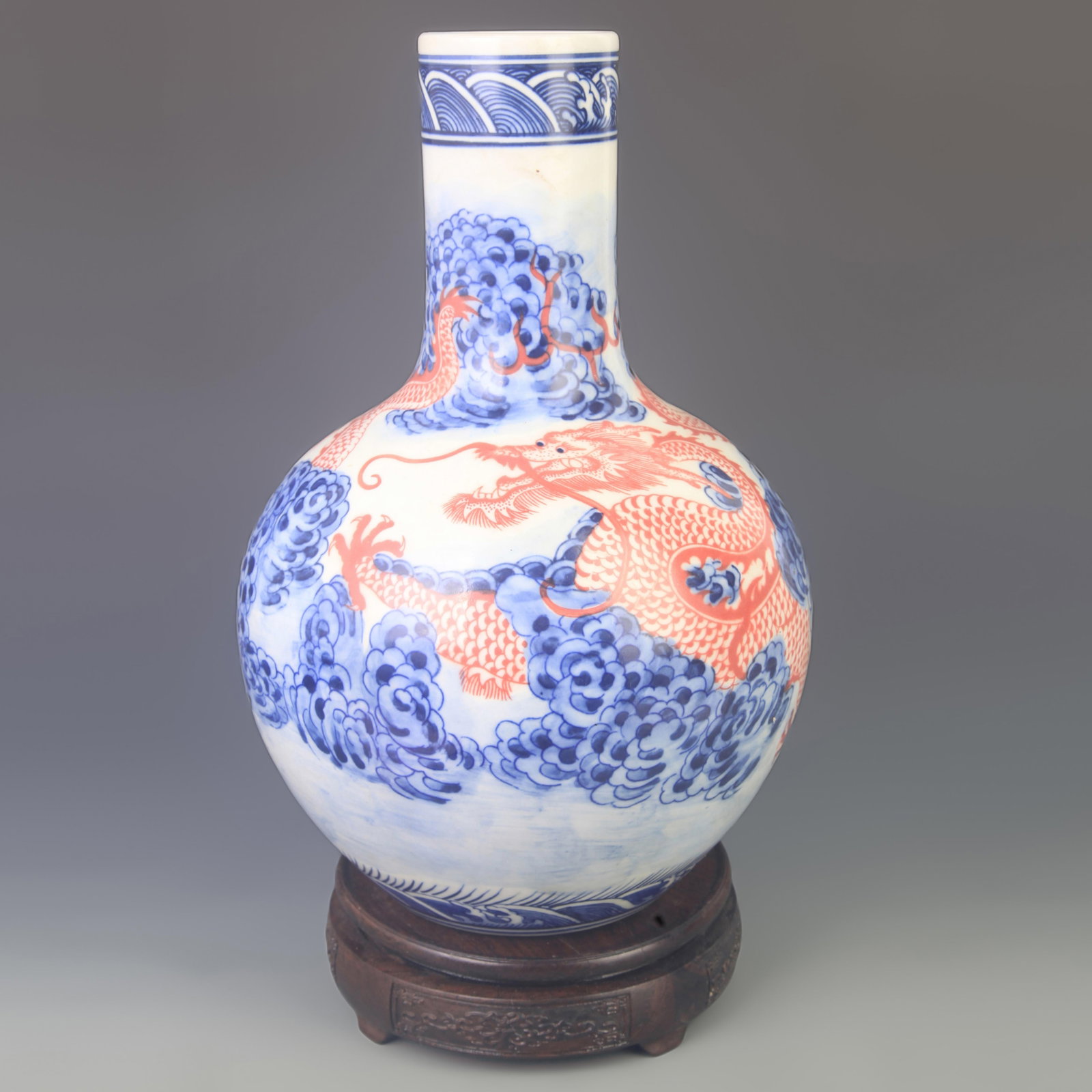BLUE-AND-WHITE UNDERGLAZE RED GLOBULAR STYLE PORCELAIN VASE: Qing Dynasty Yong Zheng Period; High: 12.5 inch; Diameter: 8.00 inch; ;Wooden base for picture and display only.