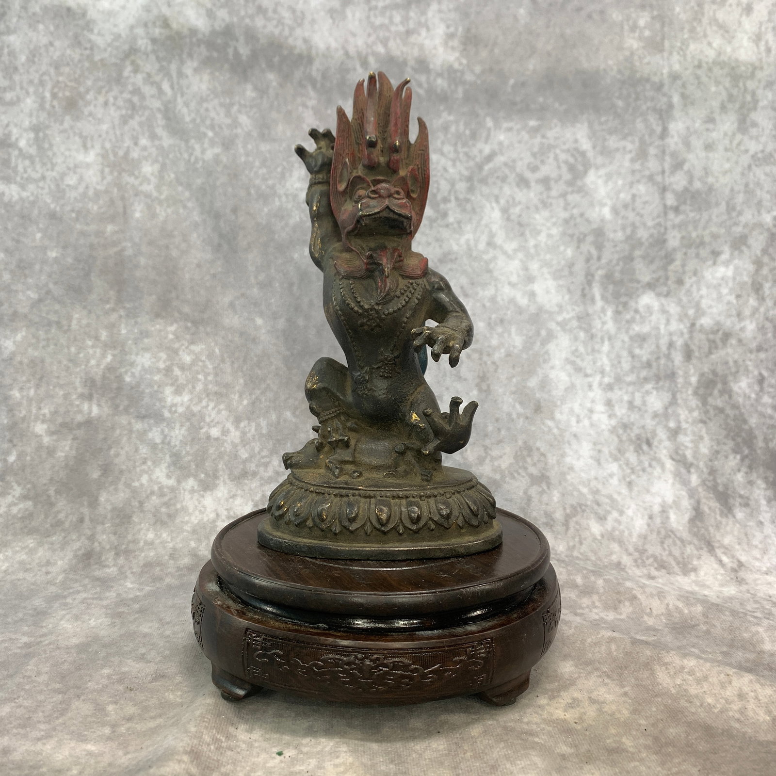 A FINE BRONZE SIMHAMUKHA (LION-FACED DAKINI) FIGURINE: Qing Dynasty; Long: 4.4 inch; Width: 3.2 inch; High: 8.5 inch; ;Wooden base for picture and display only.