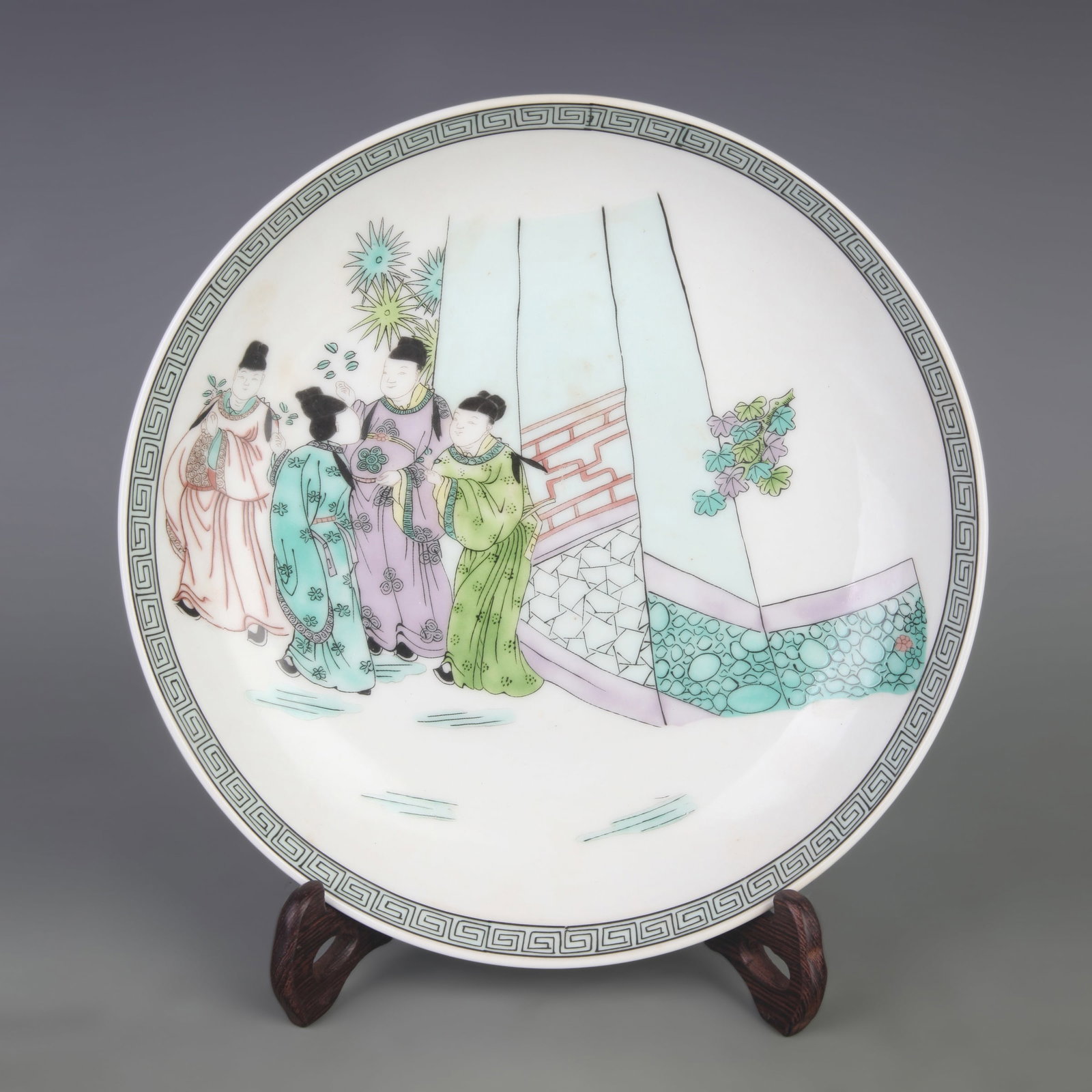FAMILLE ROSE PLATE WITH HUMAN STORY FIGURES: Qing Dynasty Qian Long Period; Diameter: 8.8 inch; High: 1.8 inch ;Wooden base for picture and display only.