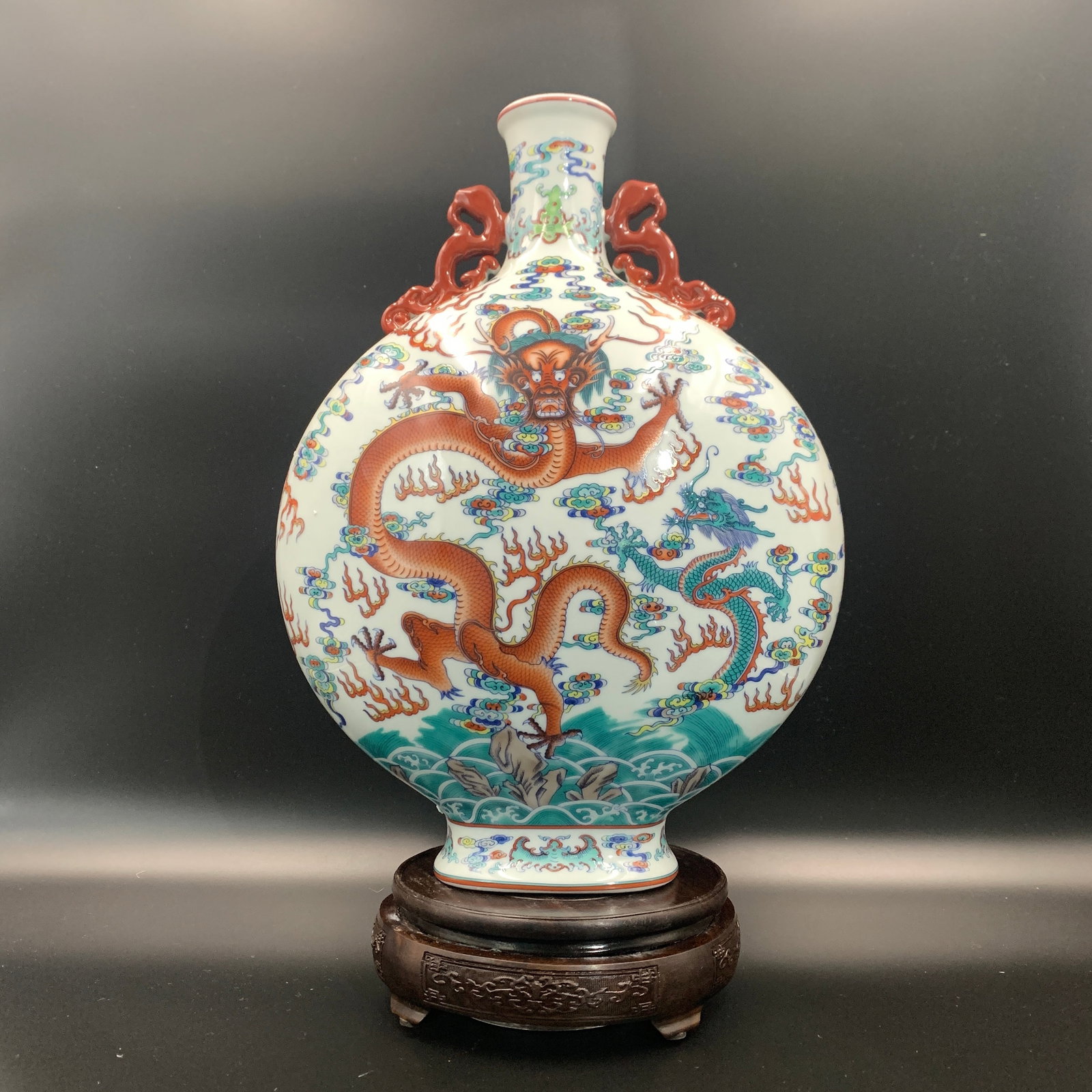 FAMILLE ROSE DRAGON PATTERN PORCELAIN MOONFLASK: Qing Dynasty; Long: 10.9 inch; Width: 5.6 inch; High: 14.4 inch; ;Wooden base for picture and display only.