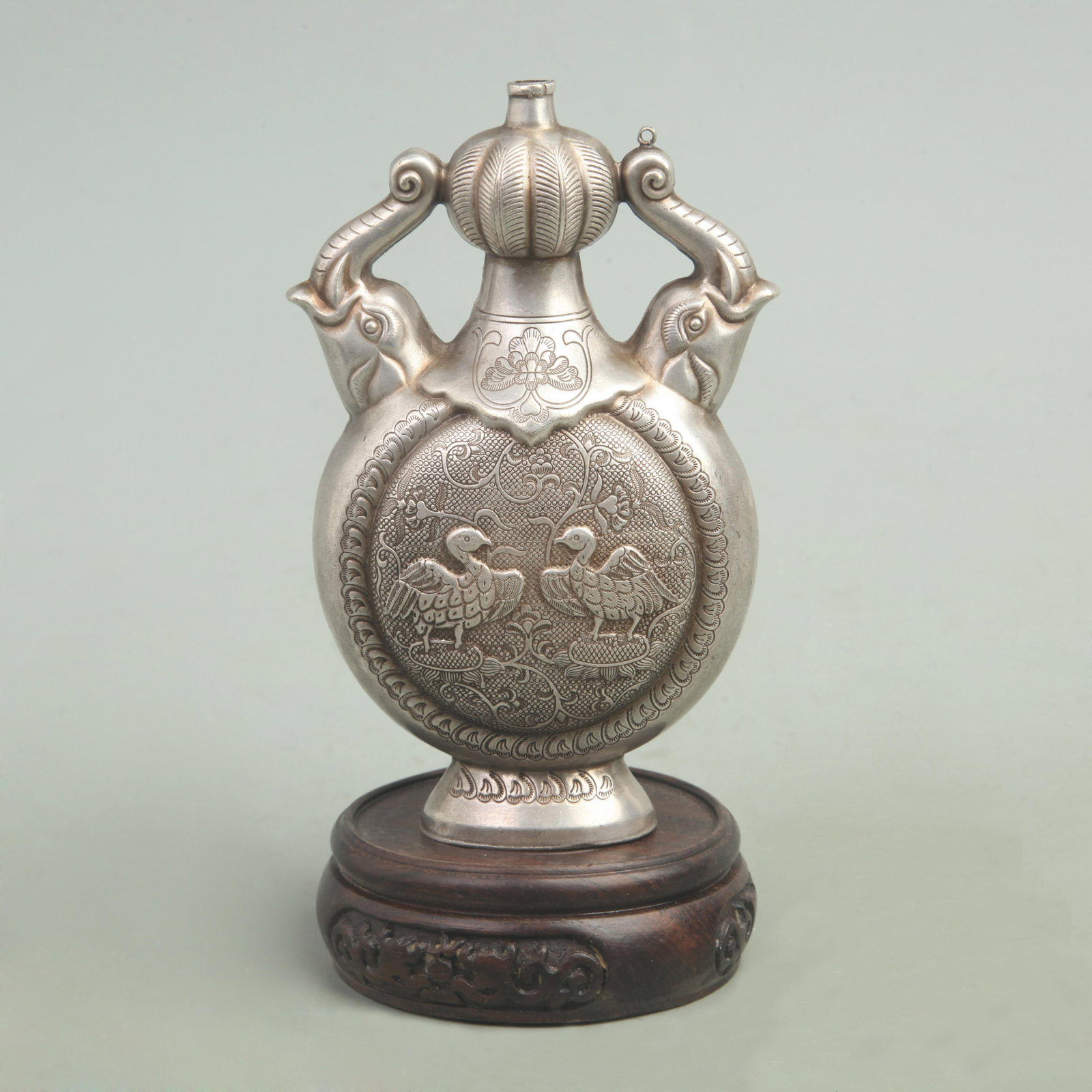 RARE SILVER PLATED BIRD PATTERN SNUFF BOTTLE: Qing Dynasty; Long: 5.6 inch; Width: 3.1 inch; Diameter: 1.6 inch; ;Wooden base for picture and display only.