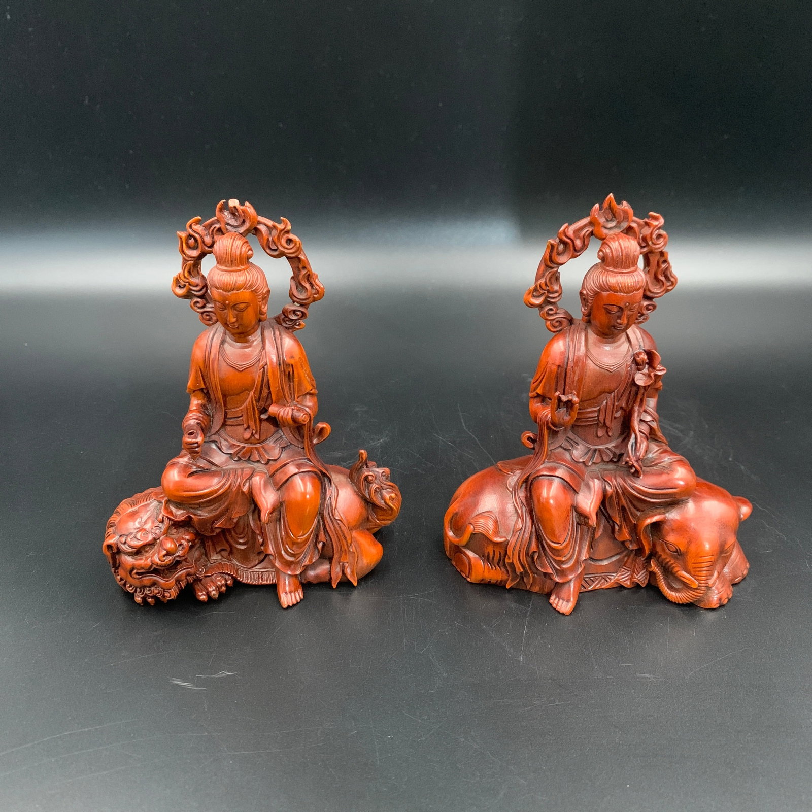 PAIR OF BOXWOOD MANJUSRI AND SAMANTABHADRA BODHISATTVA STATUES: Modern; Long: 3.9 inch; Width: 2 inch; High: 5 inch; Long: 4.1 inch; Width: 2.3 inch; High: 5.1 inch; ;Wooden base for picture and display only.