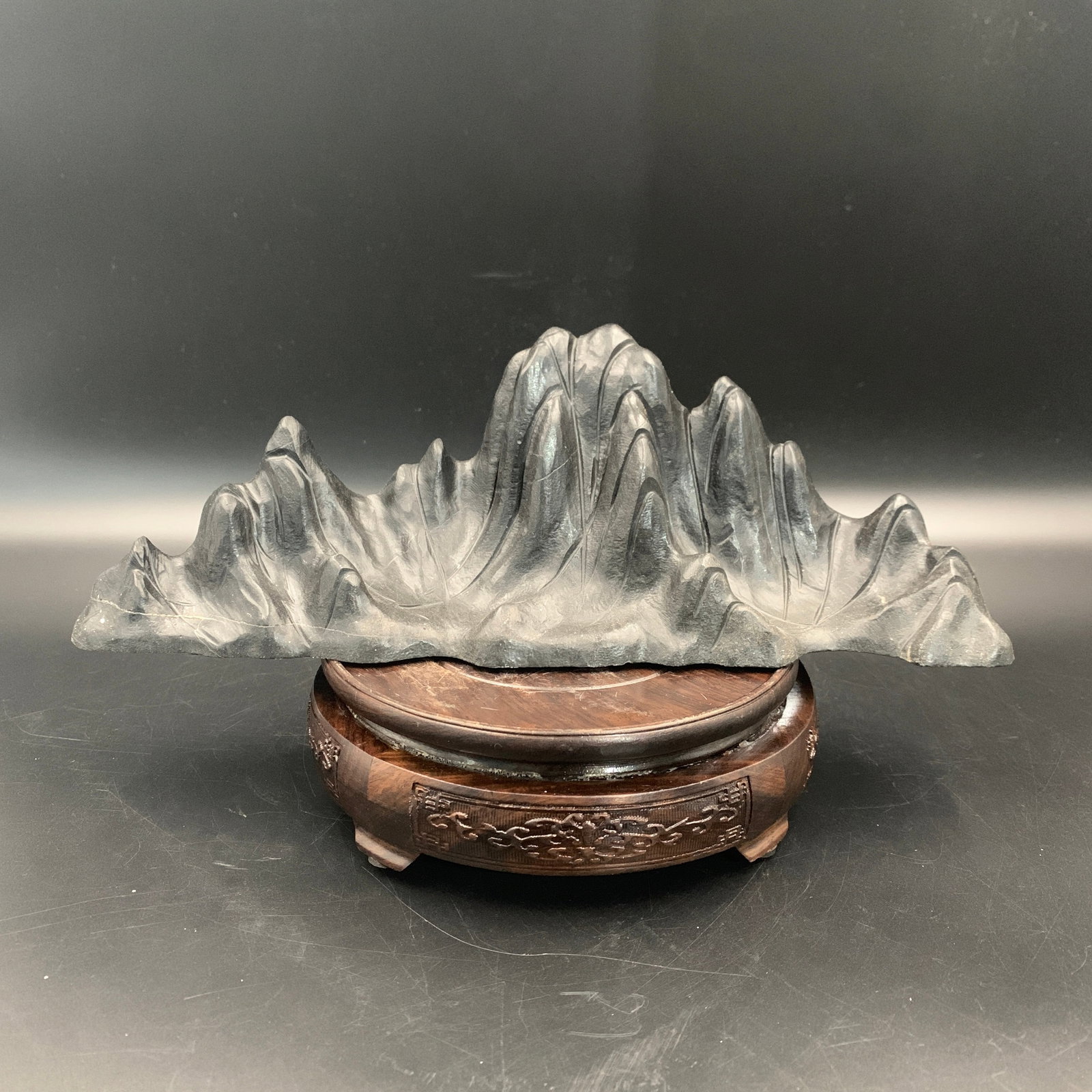 CARVED LINGBI STONE IN SCHOLAR'S MOUNTAIN BRUSH REST: Republic Period; Long: 11.7 inch; Width: 3.1 inch; High: 8.3 inch; ;Wooden base for picture and display only.