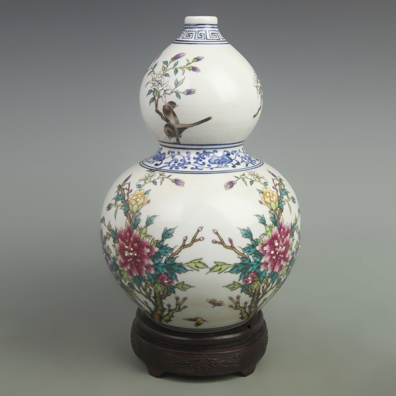FAMILLE ROSE BLUE GROUND PEONY FLOWER GOURD PORCELAIN VASE: Qing Dynasty Yong Zheng Period; High: 12.5 inch; Width: 8.5 inch ;Wooden base for picture and display only.