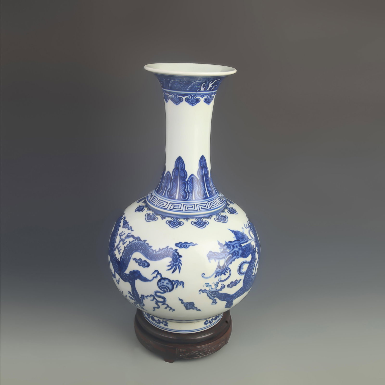 BLUE AND WHITE WIDE-MOUTHED VASE WITH DRAGON DECORATION: Qing Dynasty Qian Long Period; High: 16.0 inch; Diameter:8.80 inch ;Wooden base for picture and display only.